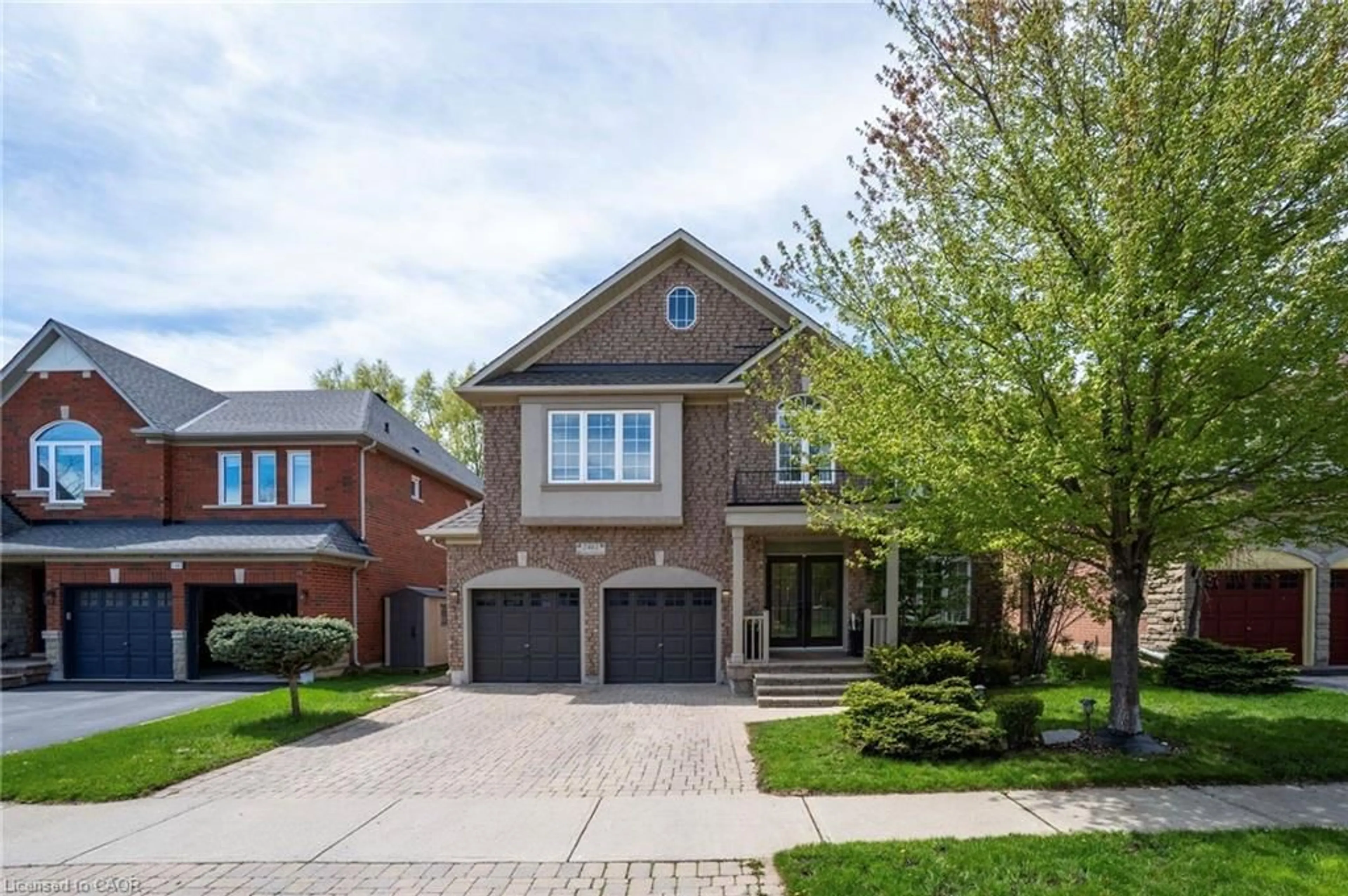 Home with brick exterior material, street for 2461 Whistling Springs Cres, Oakville Ontario L6M 5G4