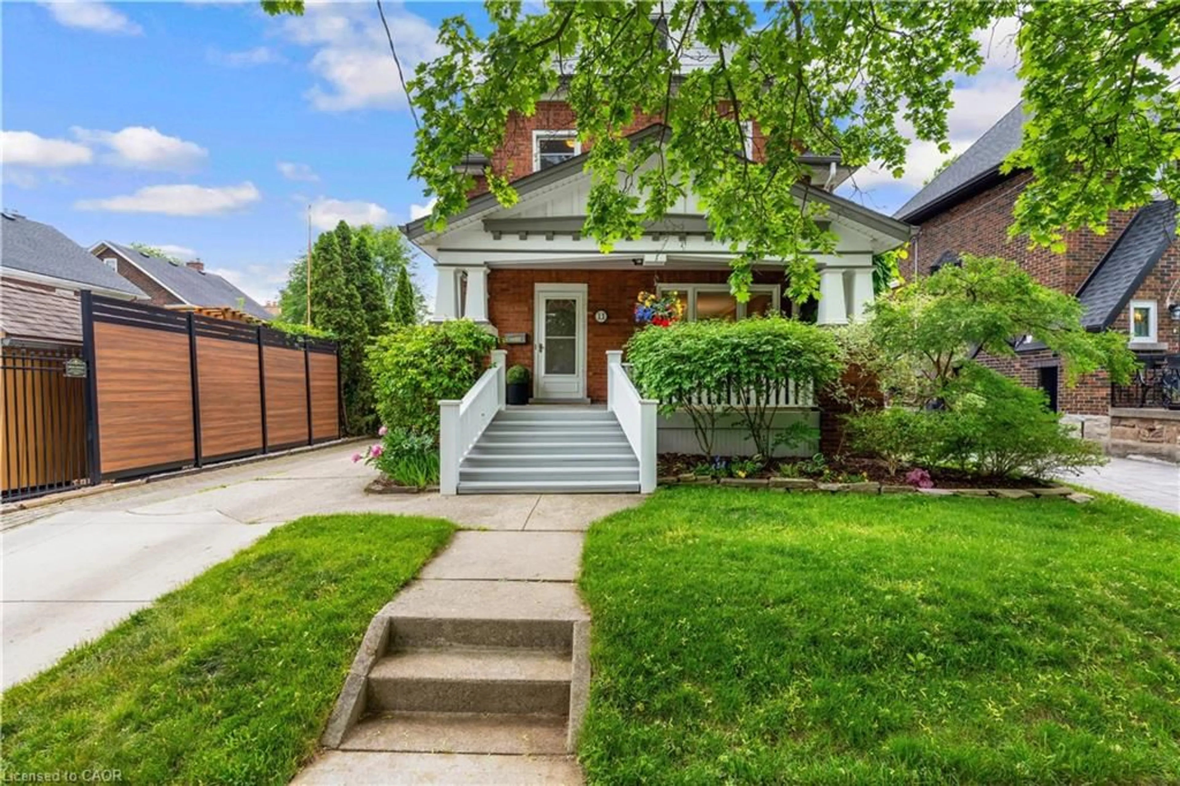 Home with brick exterior material, street for 11 Earl St, Kitchener Ontario N2M 2V5