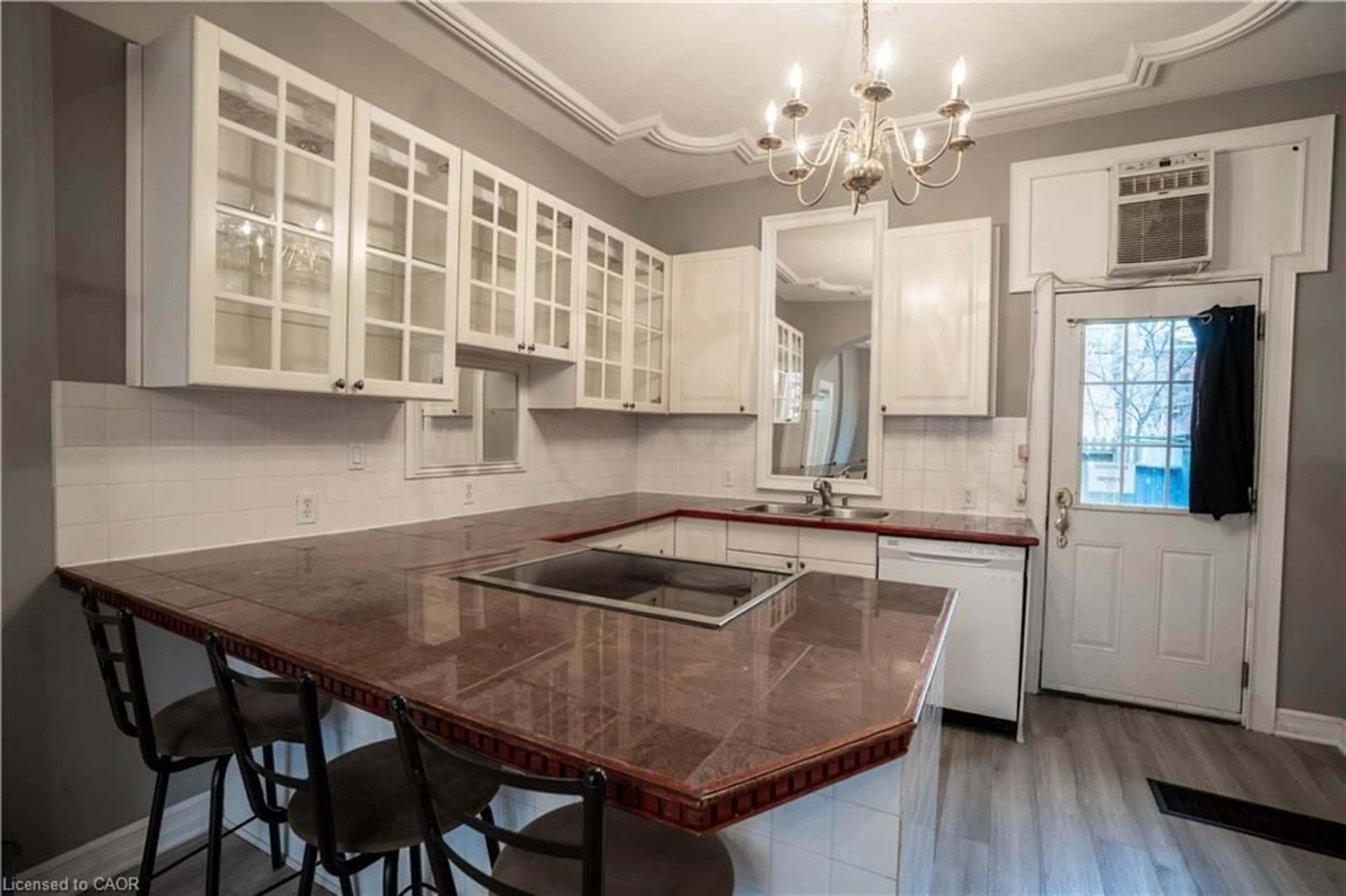 Open concept kitchen, ceramic/tile floor for 127 East Ave, Hamilton Ontario L8N 2T6