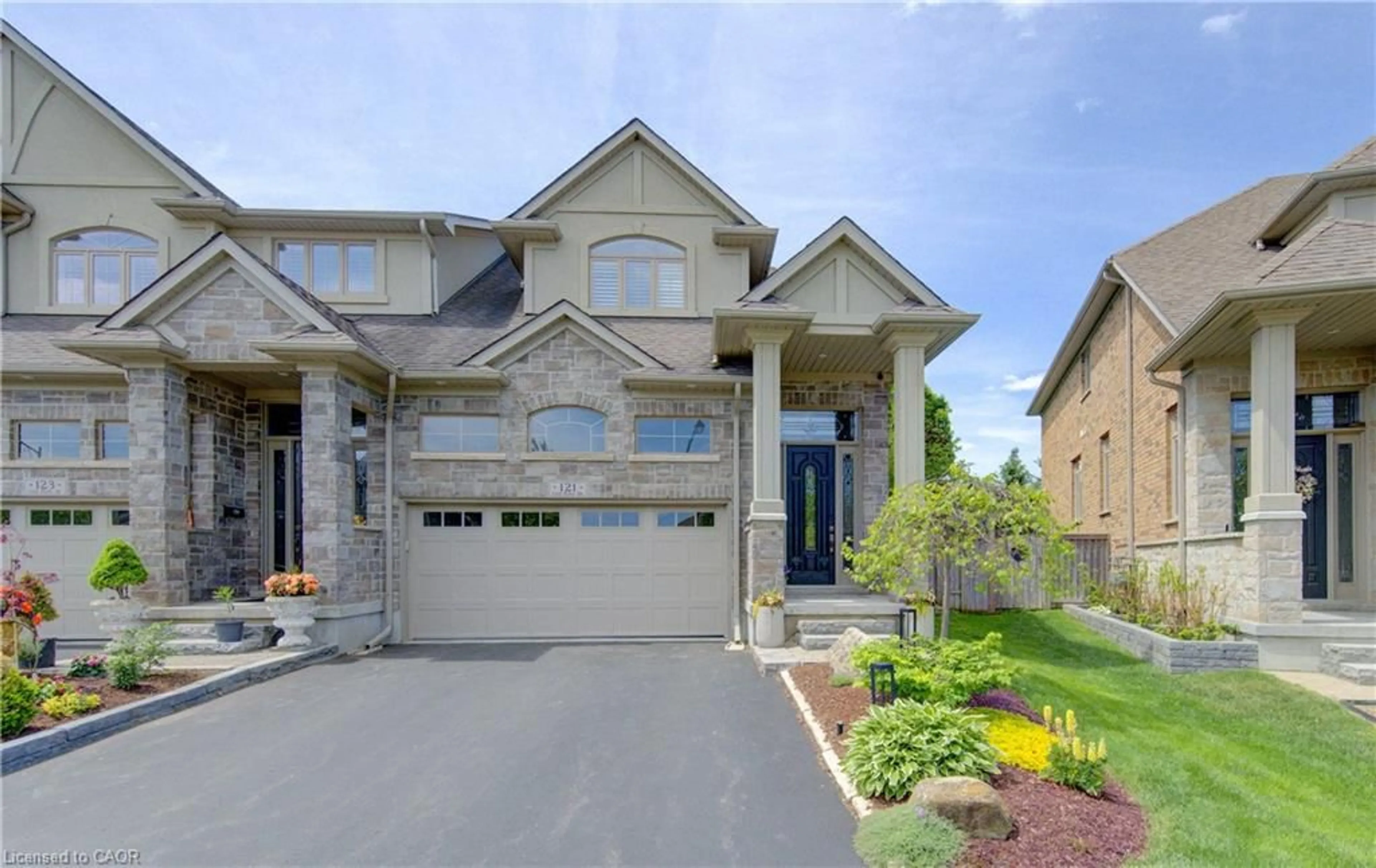 Home with brick exterior material, street for 121 Oak Park Dr, Waterloo Ontario N2K 0B3