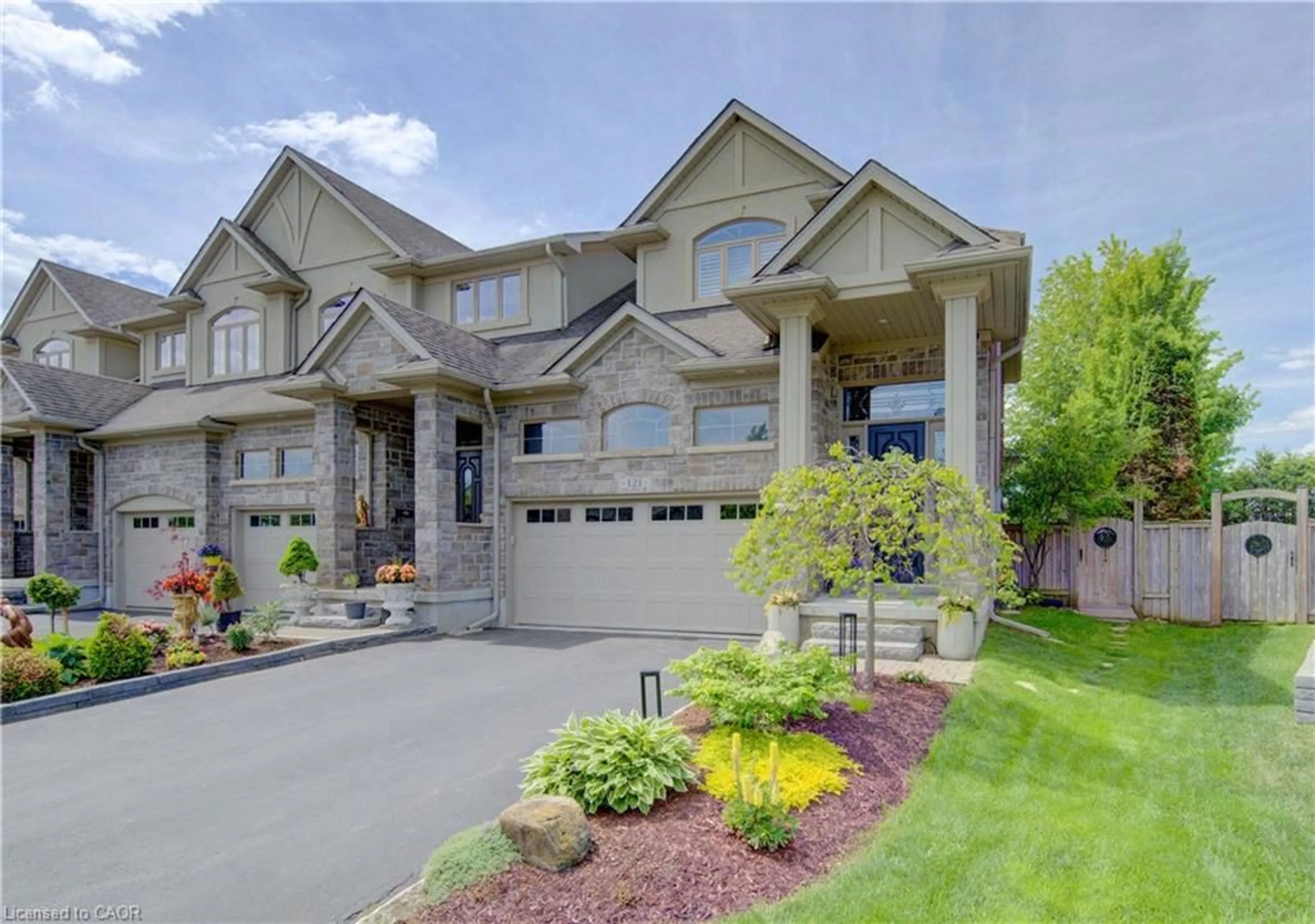 Home with brick exterior material, street for 121 Oak Park Dr, Waterloo Ontario N2K 0B3