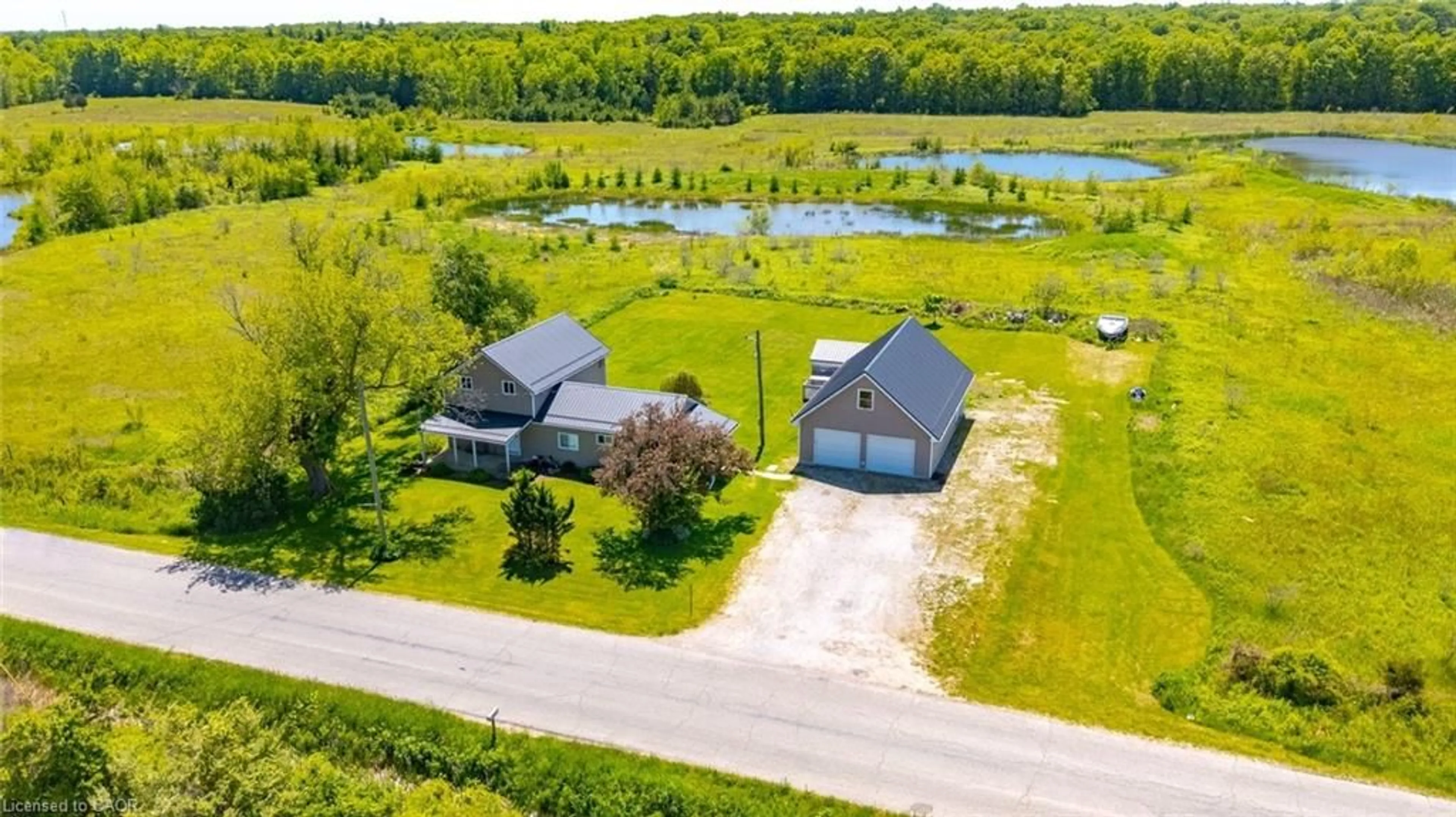 A pic from outside/outdoor area/front of a property/back of a property/a pic from drone, water/lake/river/ocean view for 571 East Quarter Line Rd, St. Williams Ontario N0E 1P0
