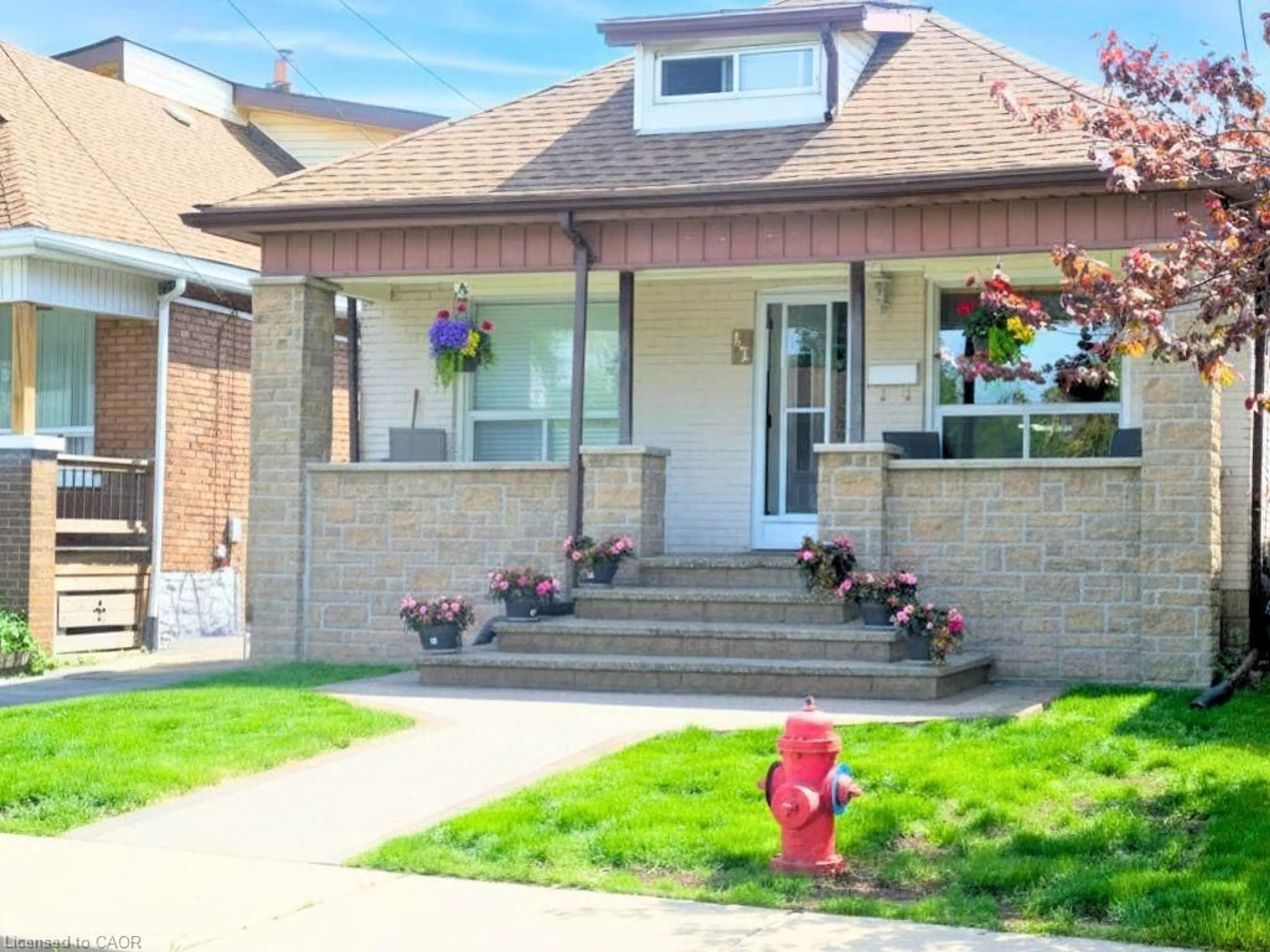 Home with brick exterior material, street for 42 Dalhousie Ave, Hamilton Ontario L8L 3J5