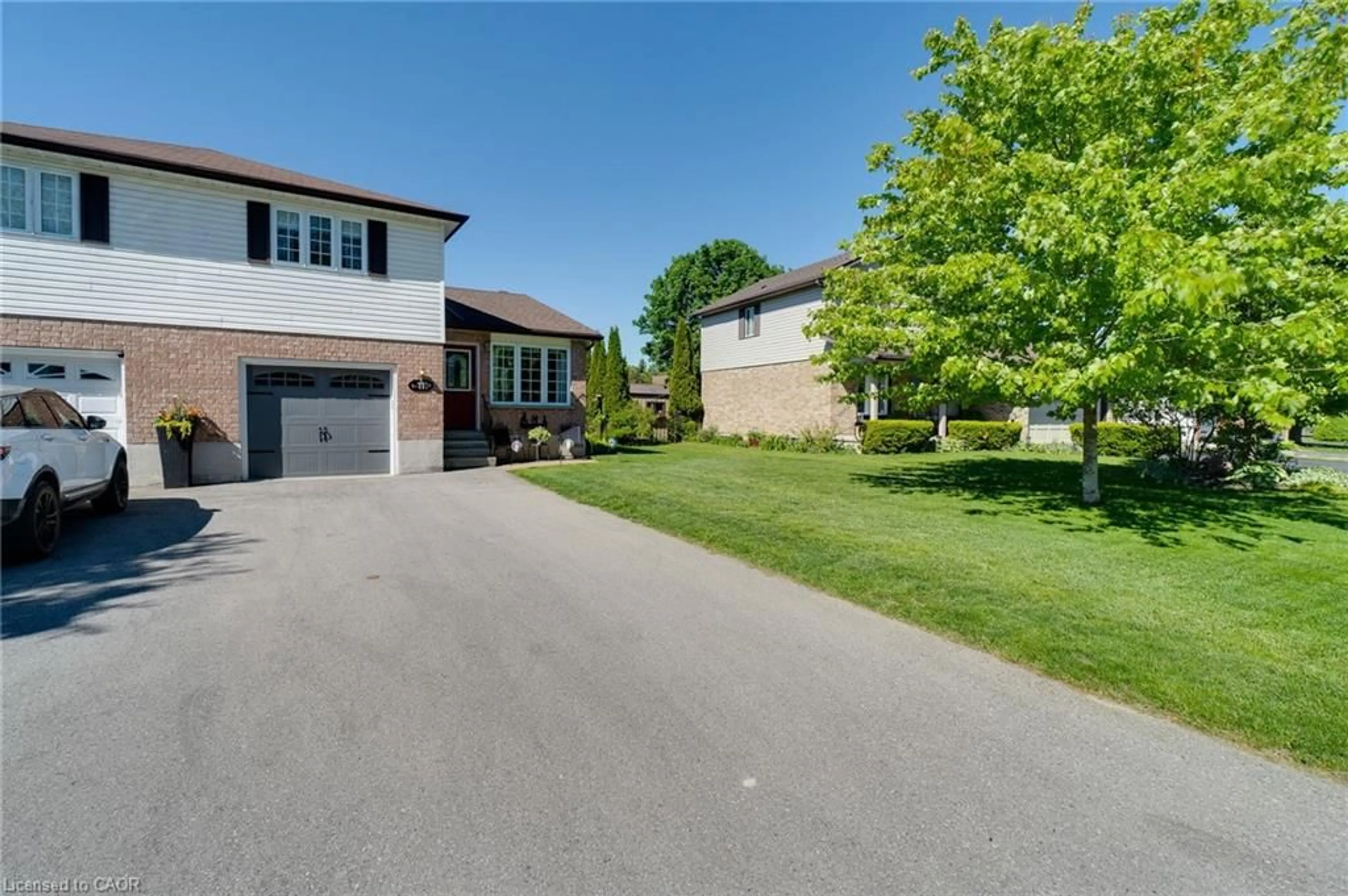 A pic from outside/outdoor area/front of a property/back of a property/a pic from drone, street for 111B Miller Cres, Palmerston Ontario N0G 2P0