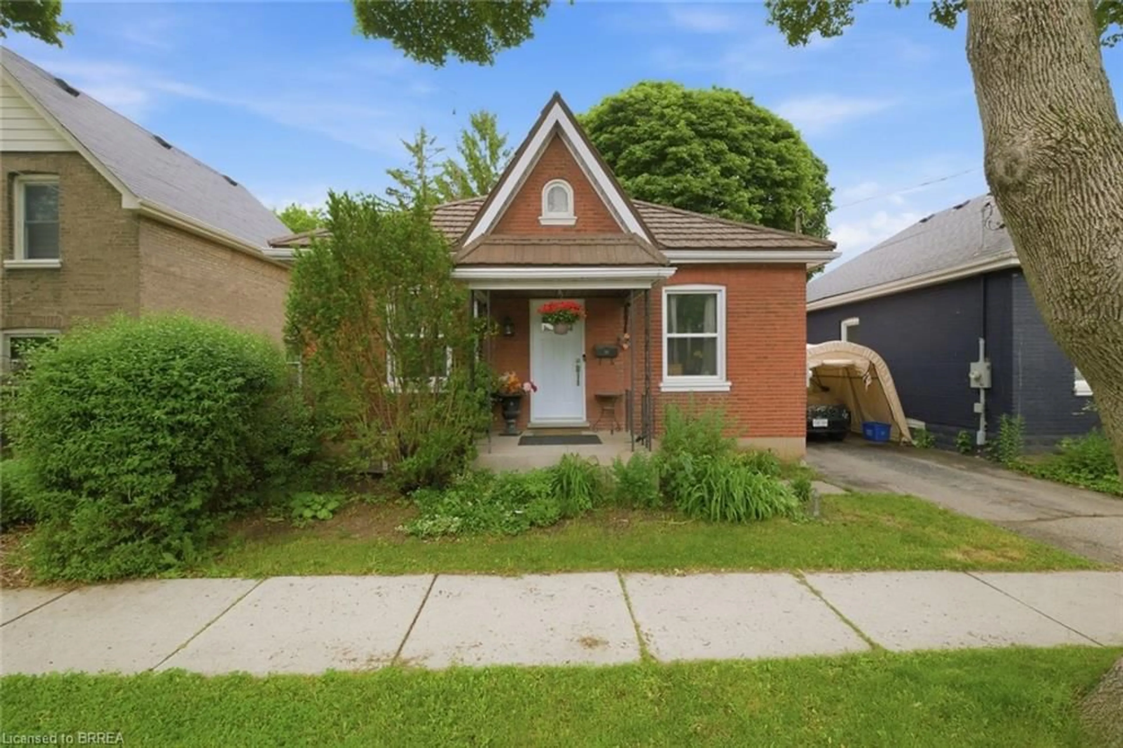 Home with brick exterior material, street for 12 Brunswick St, Brantford Ontario N3T 1E7