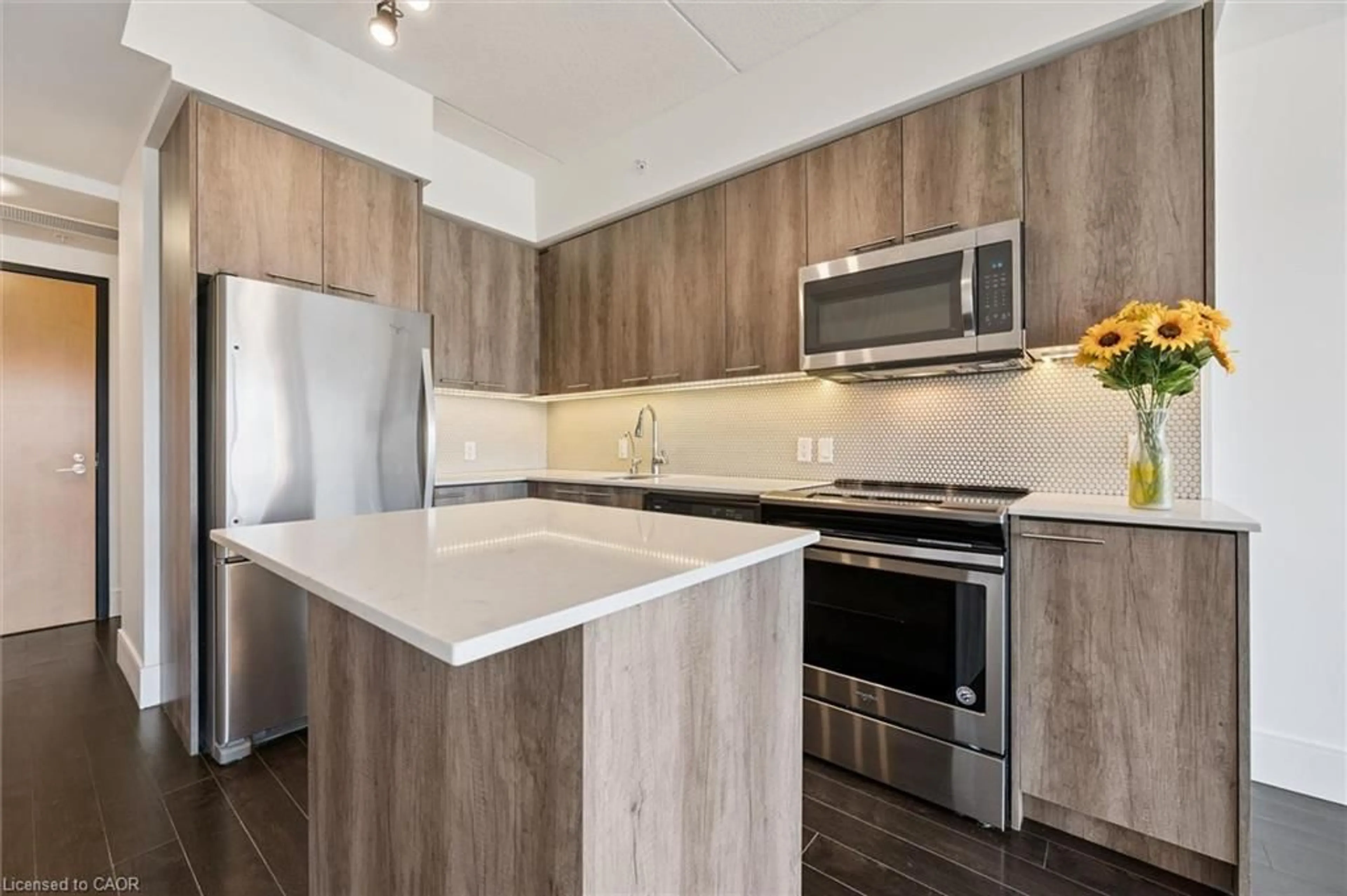 Open concept kitchen, wood/laminate floor for 15 Prince Albert Blvd #203, Kitchener Ontario N2H 0C2