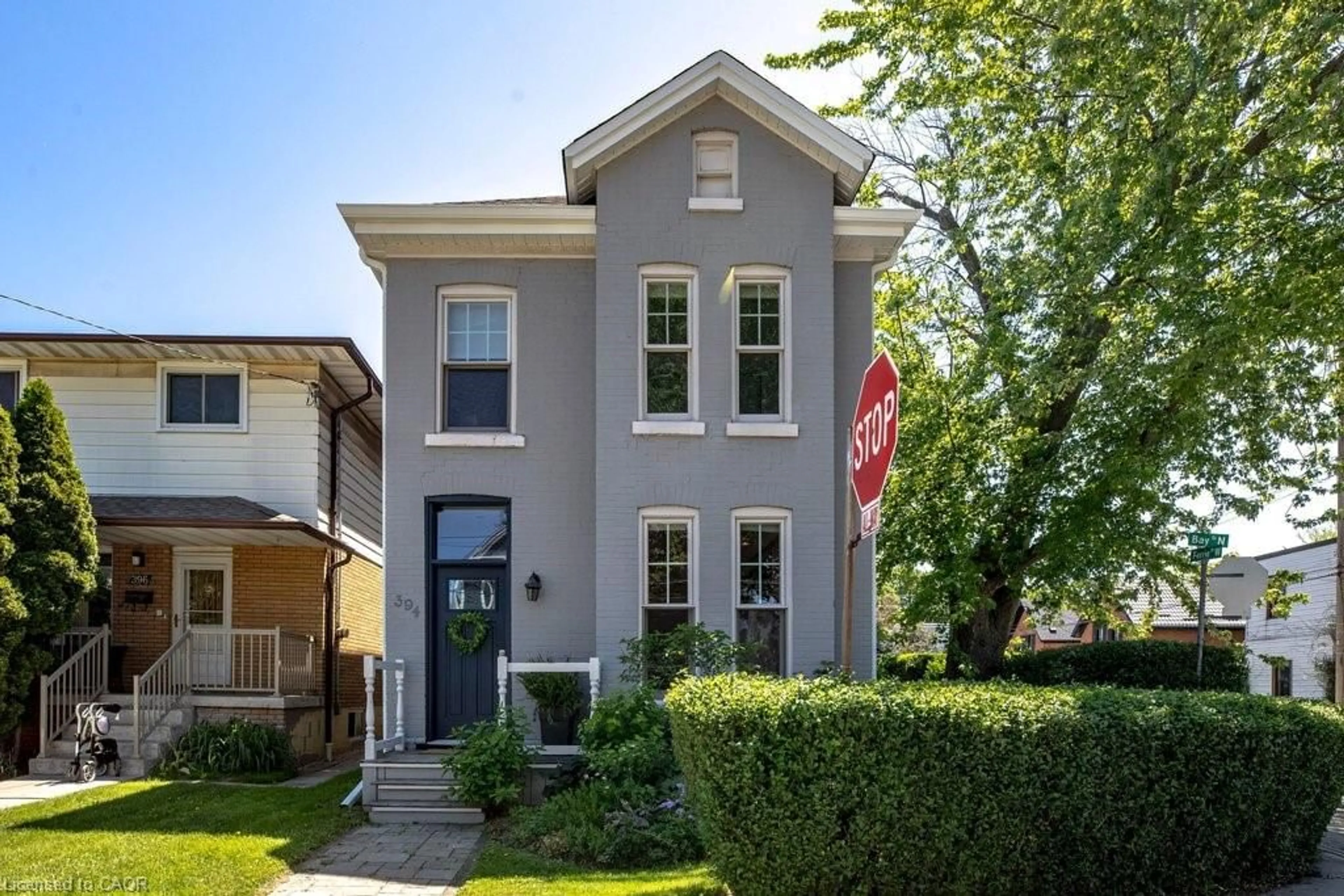 Home with brick exterior material, street for 394 Bay St, Hamilton Ontario L8L 1N1