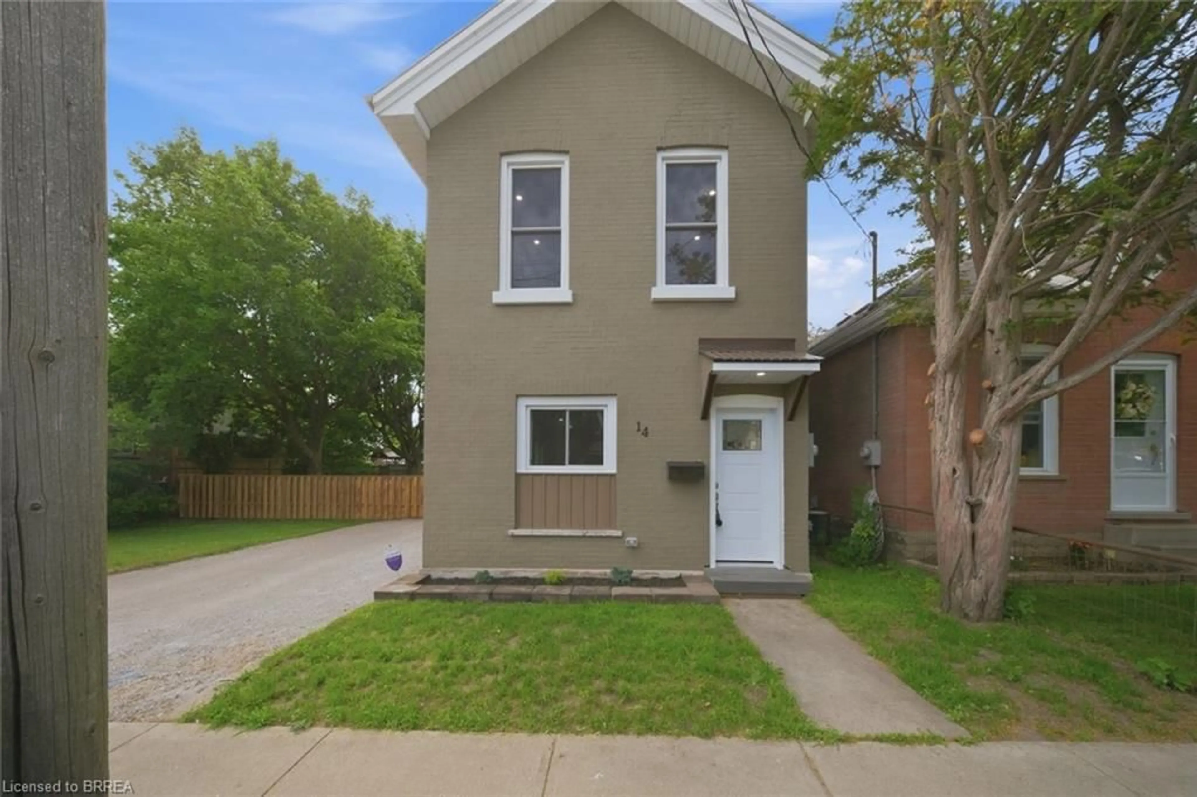 Home with brick exterior material, street for 14 Bond St, Brantford Ontario N3R 4G5