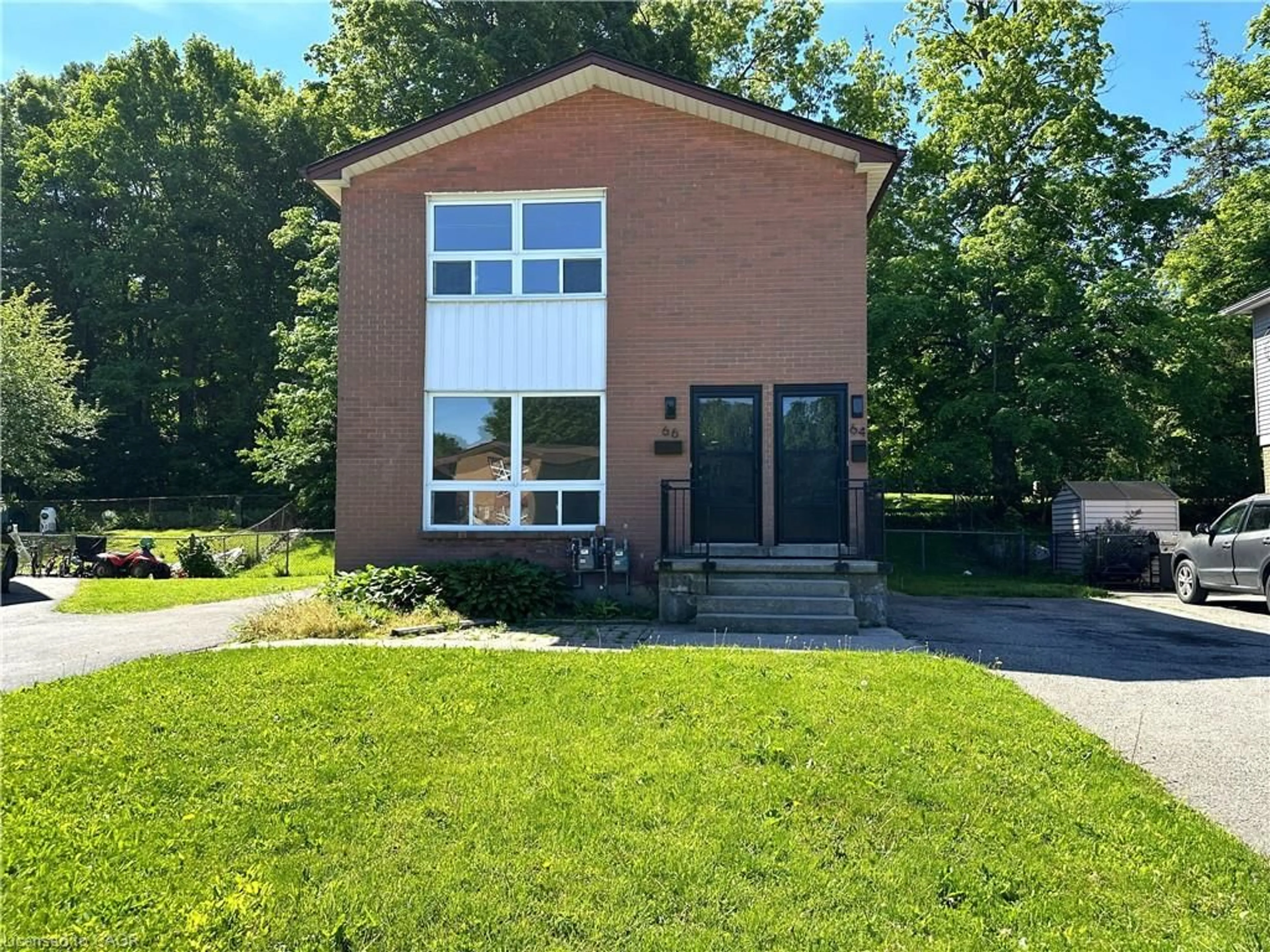 Home with brick exterior material, street for 64-66 Oakwood Ave, Simcoe Ontario N3Y 1H6