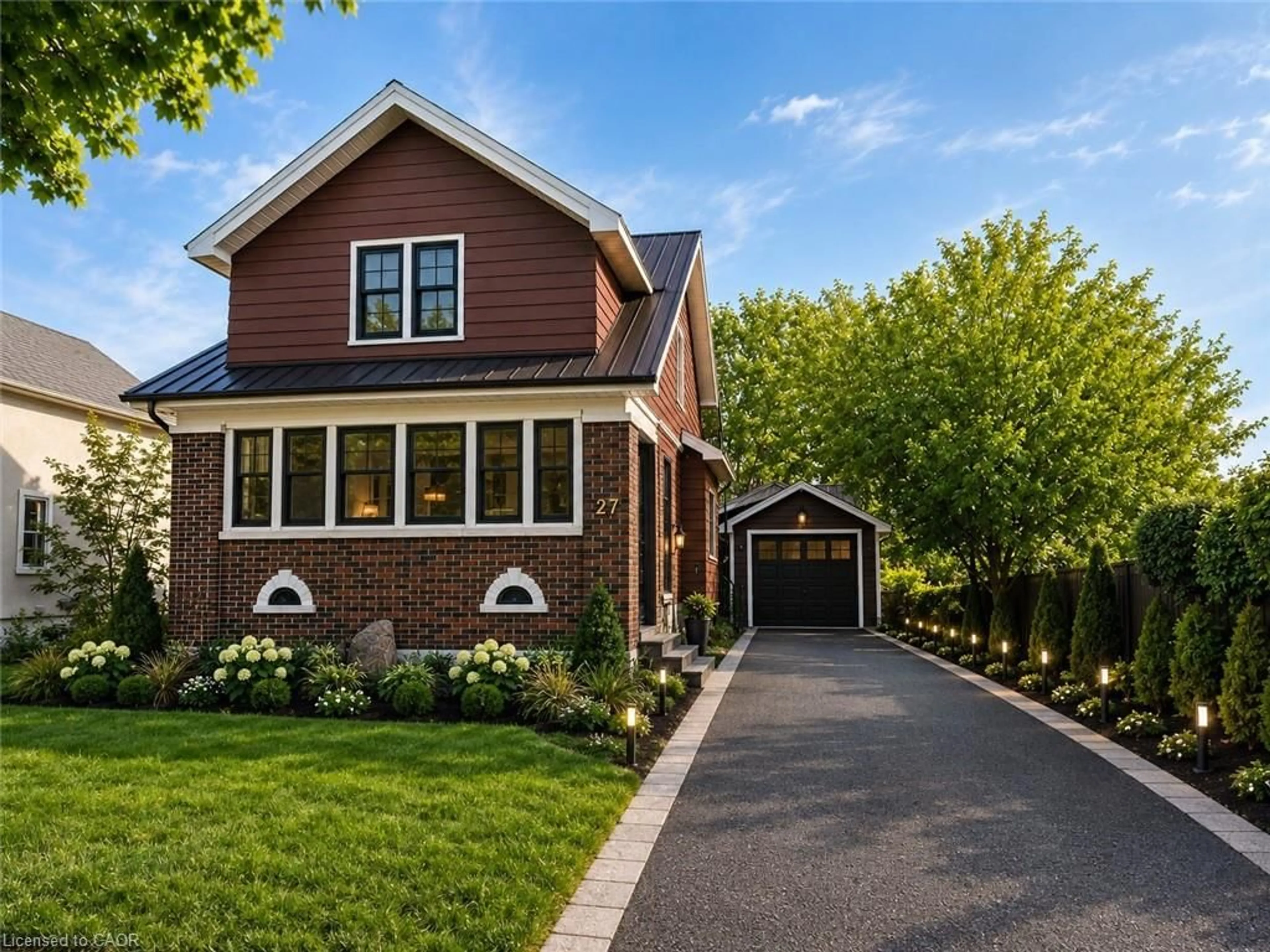 Home with brick exterior material, street for 27 Oak St, Kitchener Ontario N2G 1L4