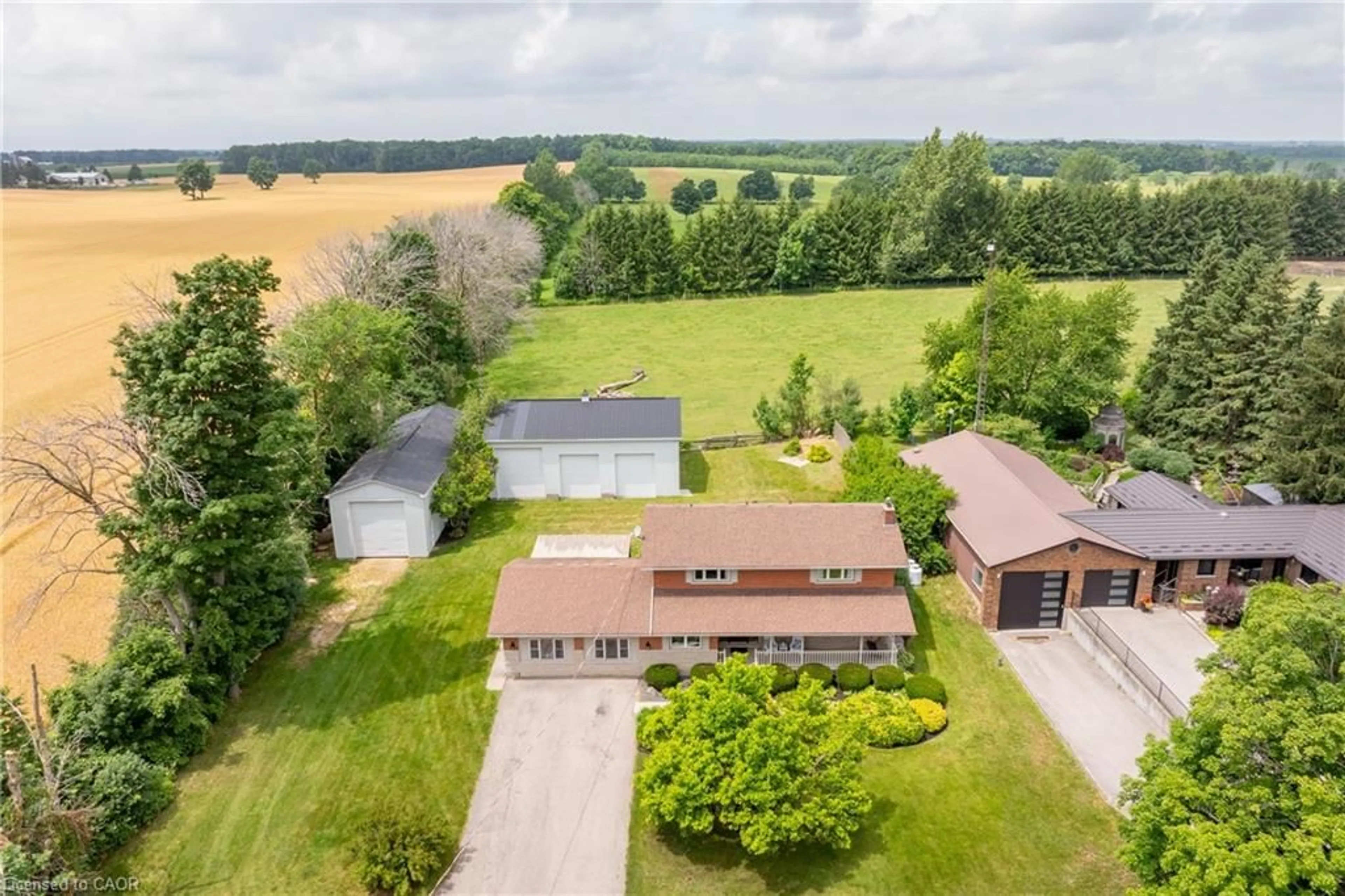 A pic from outside/outdoor area/front of a property/back of a property/a pic from drone, water/lake/river/ocean view for 7776 Mill Rd, Guelph Ontario N1H 6J1