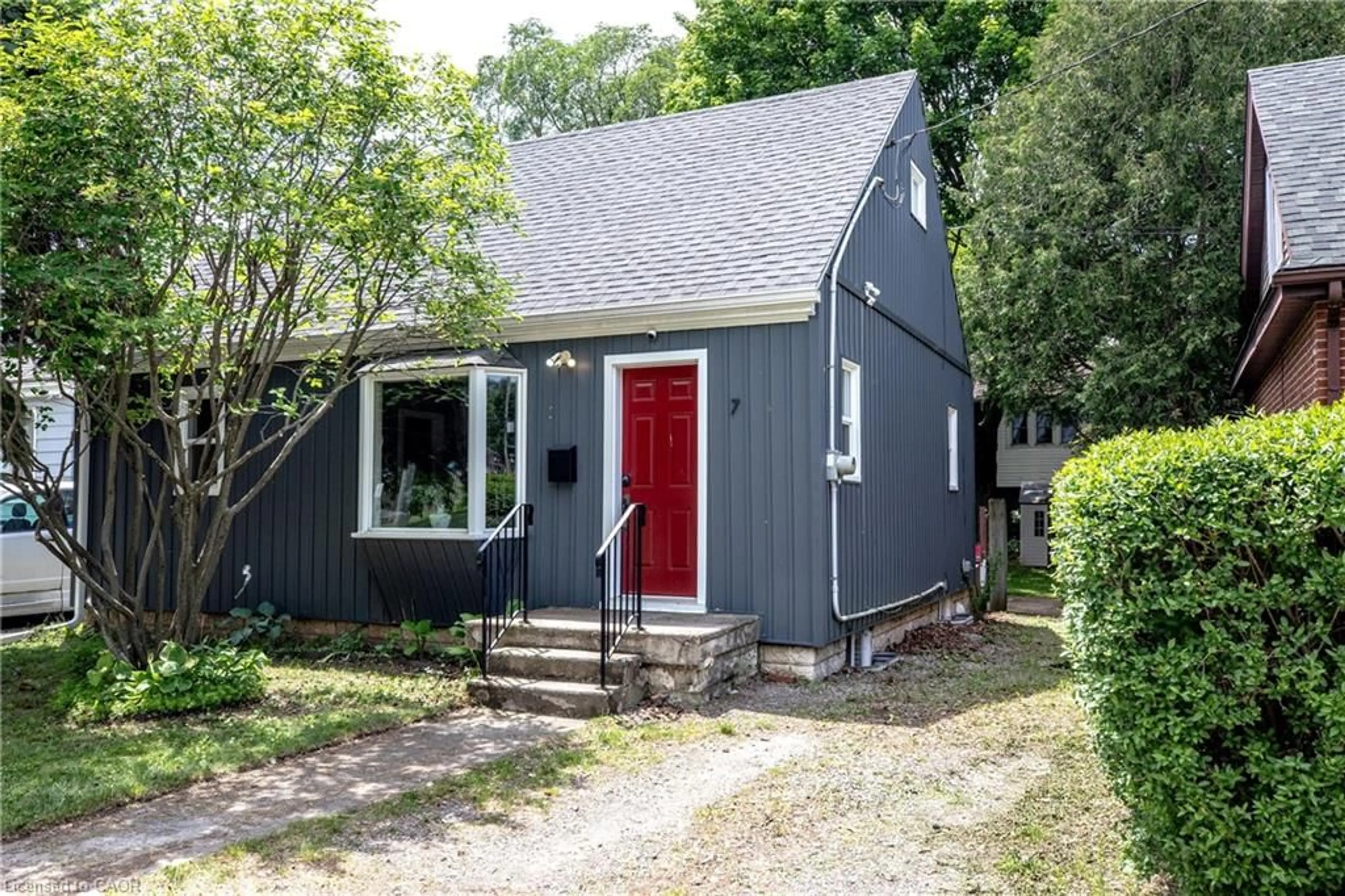 Home with vinyl exterior material, street for 7 East St, Dundas Ontario L9H 1N6