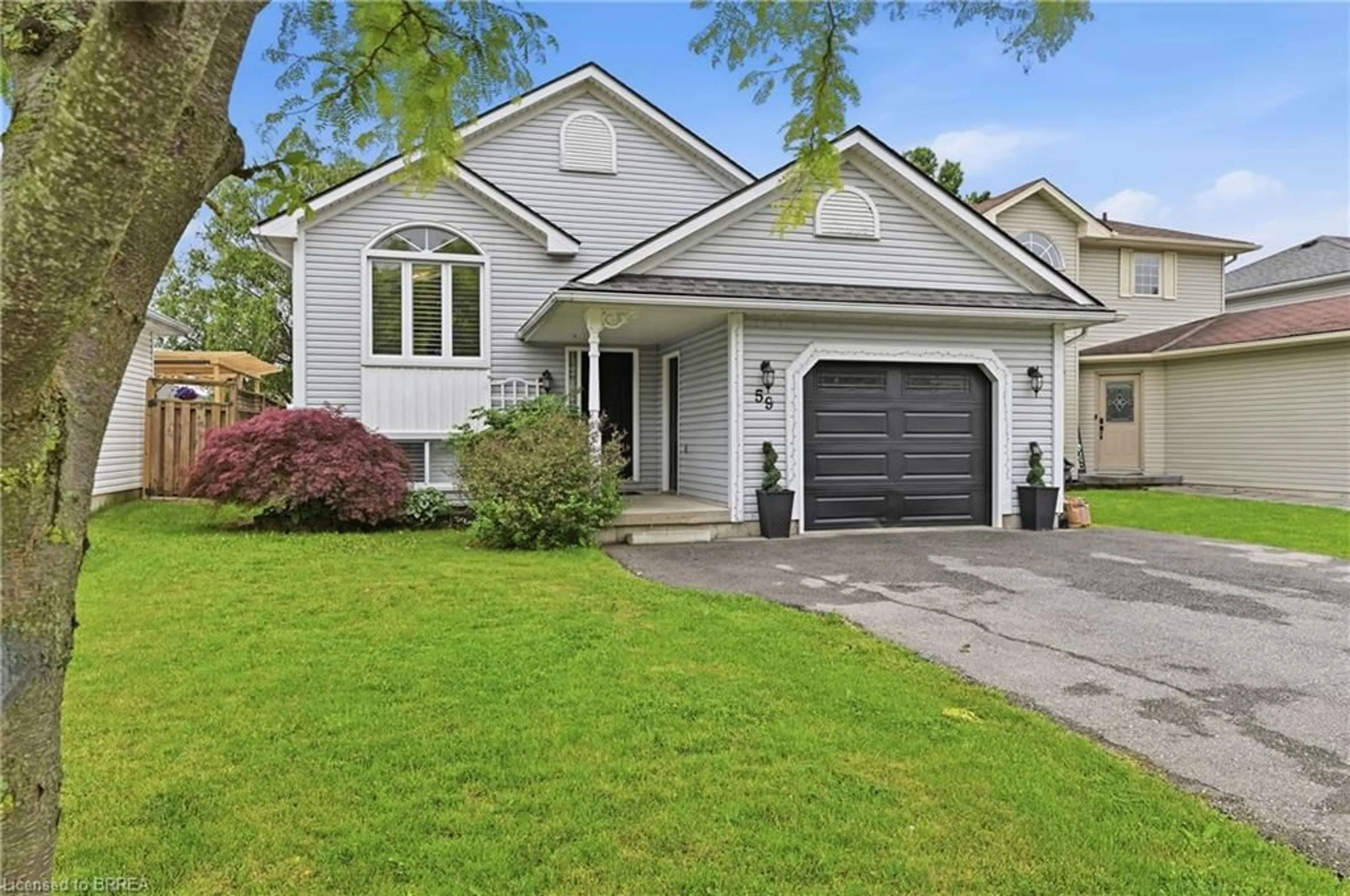 Home with vinyl exterior material, street for 59 Morgan Dr, Caledonia Ontario N3W 1H7