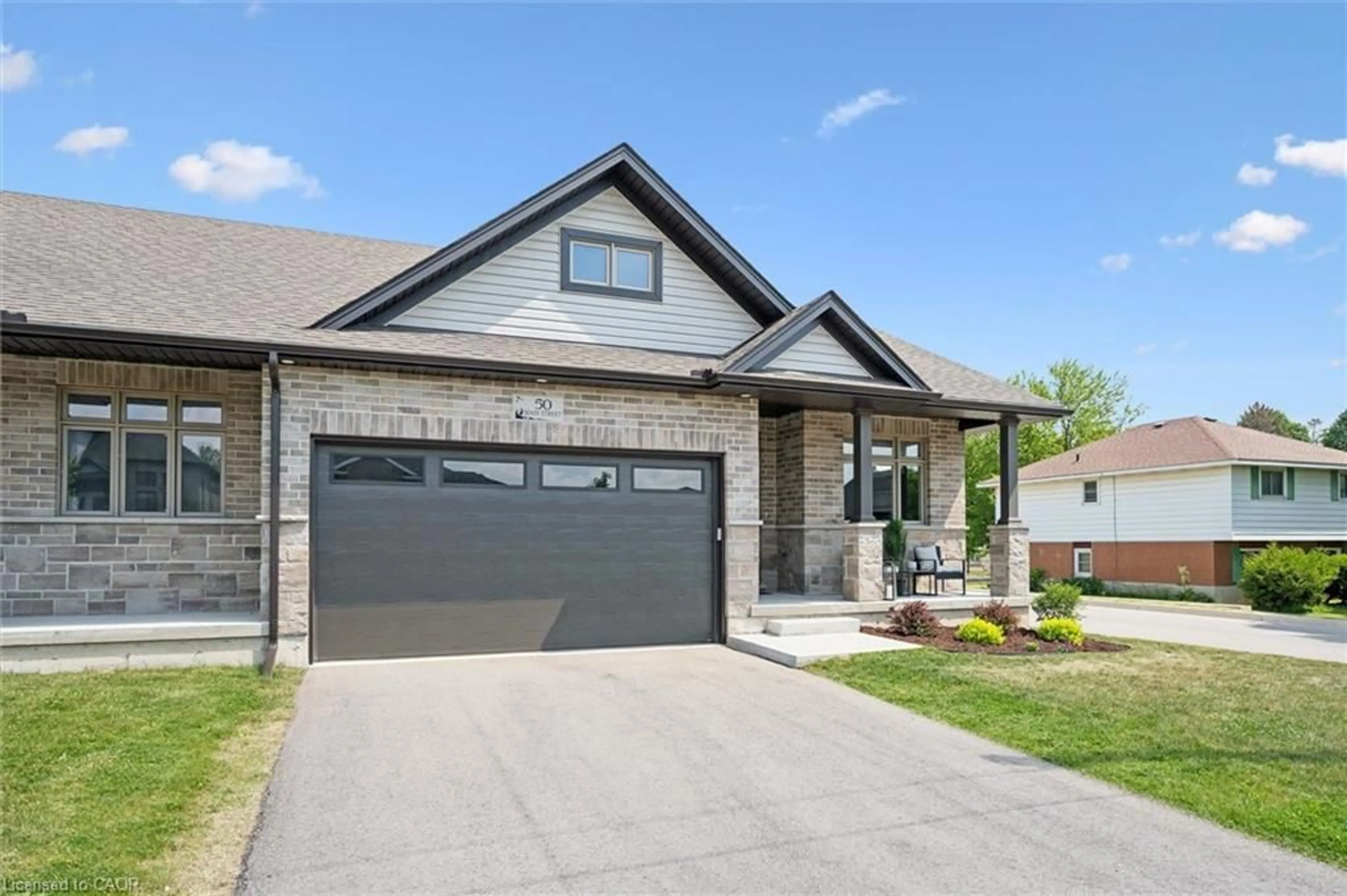 Home with brick exterior material, street for 50 Main St, Innerkip Ontario N0J 1M0