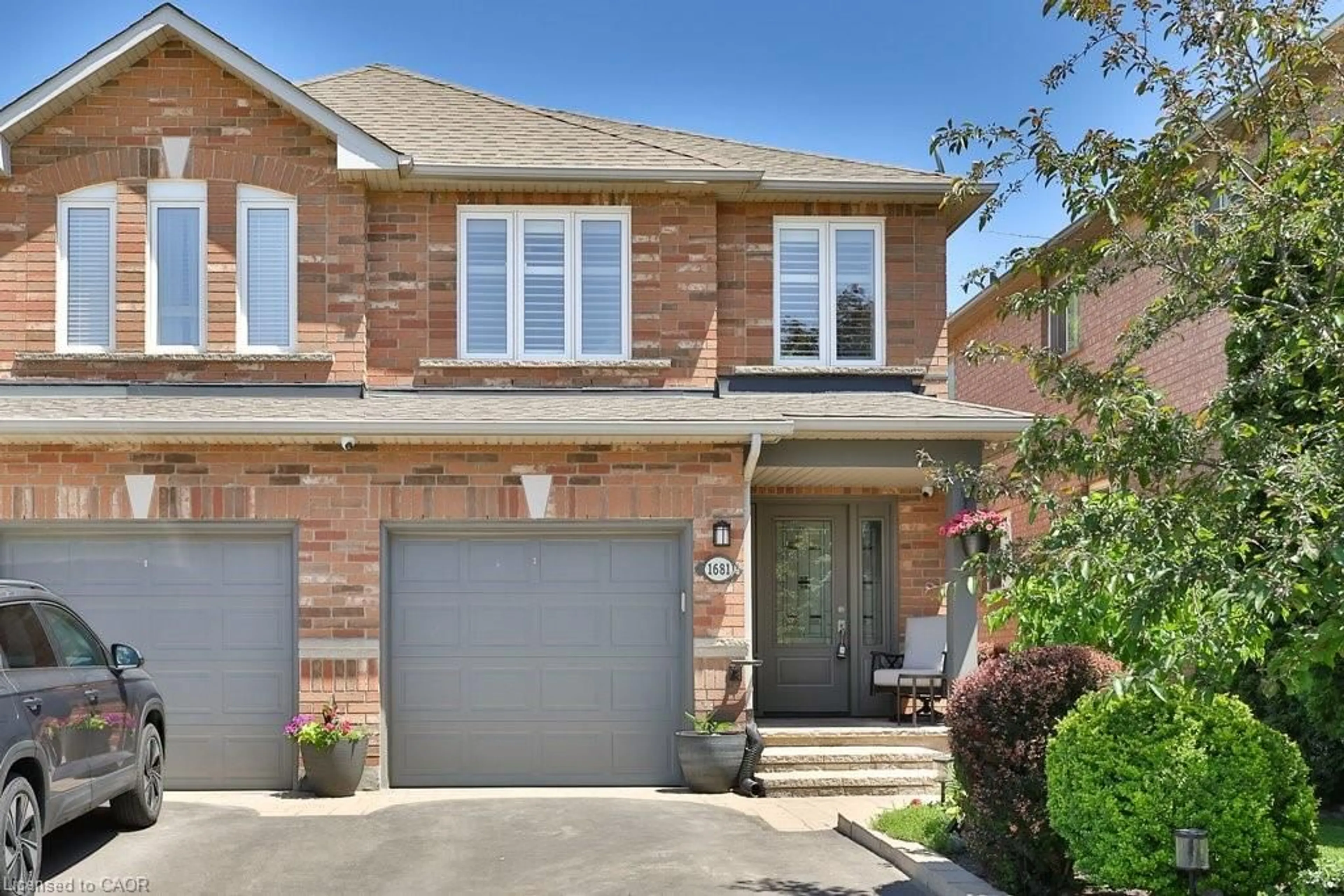 Home with brick exterior material, street for 1681 Creek Way, Burlington Ontario L7L 6R5
