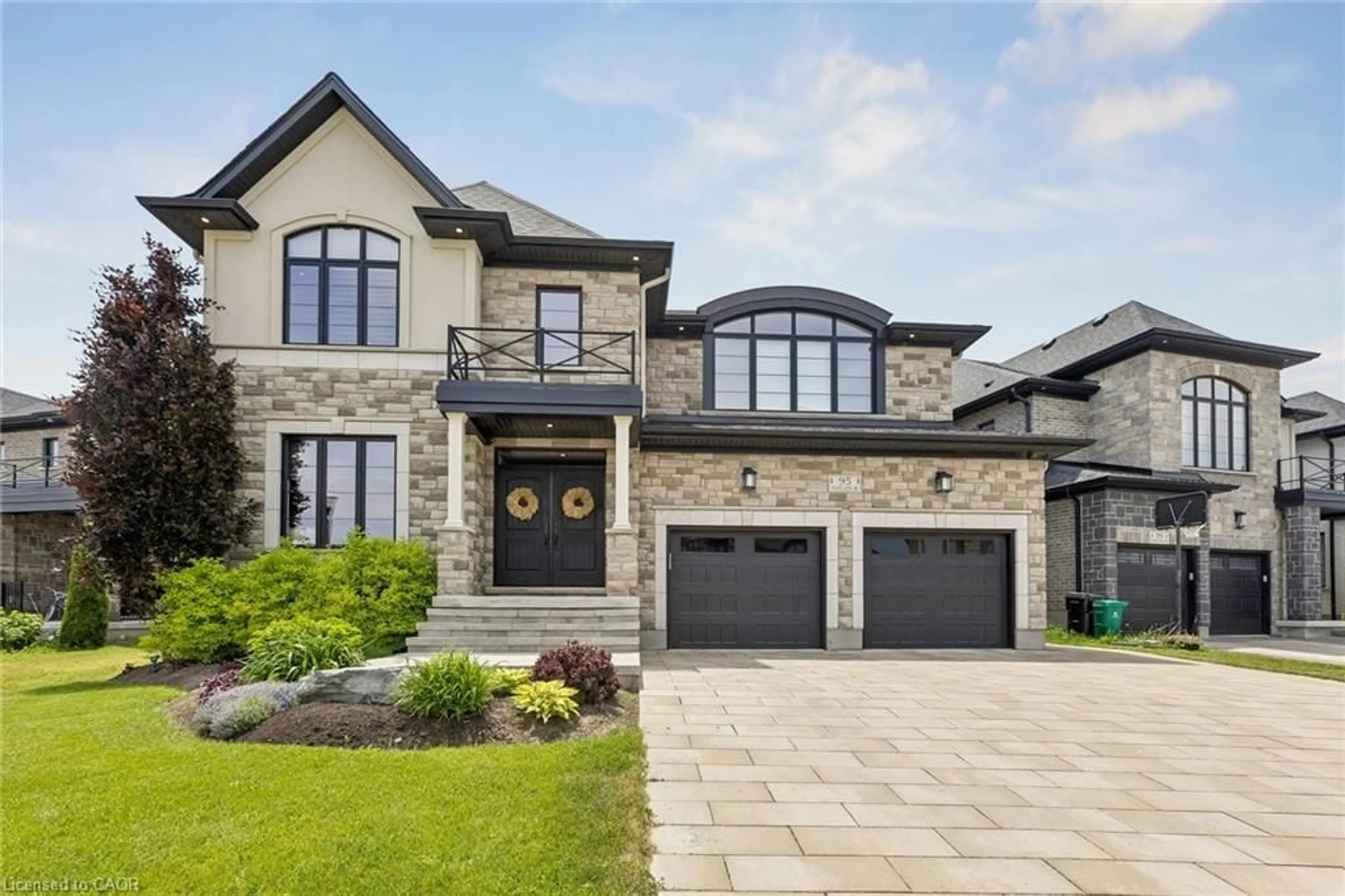 Home with brick exterior material, street for 95 Pondcliffe Dr, Kitchener Ontario N2R 0M3