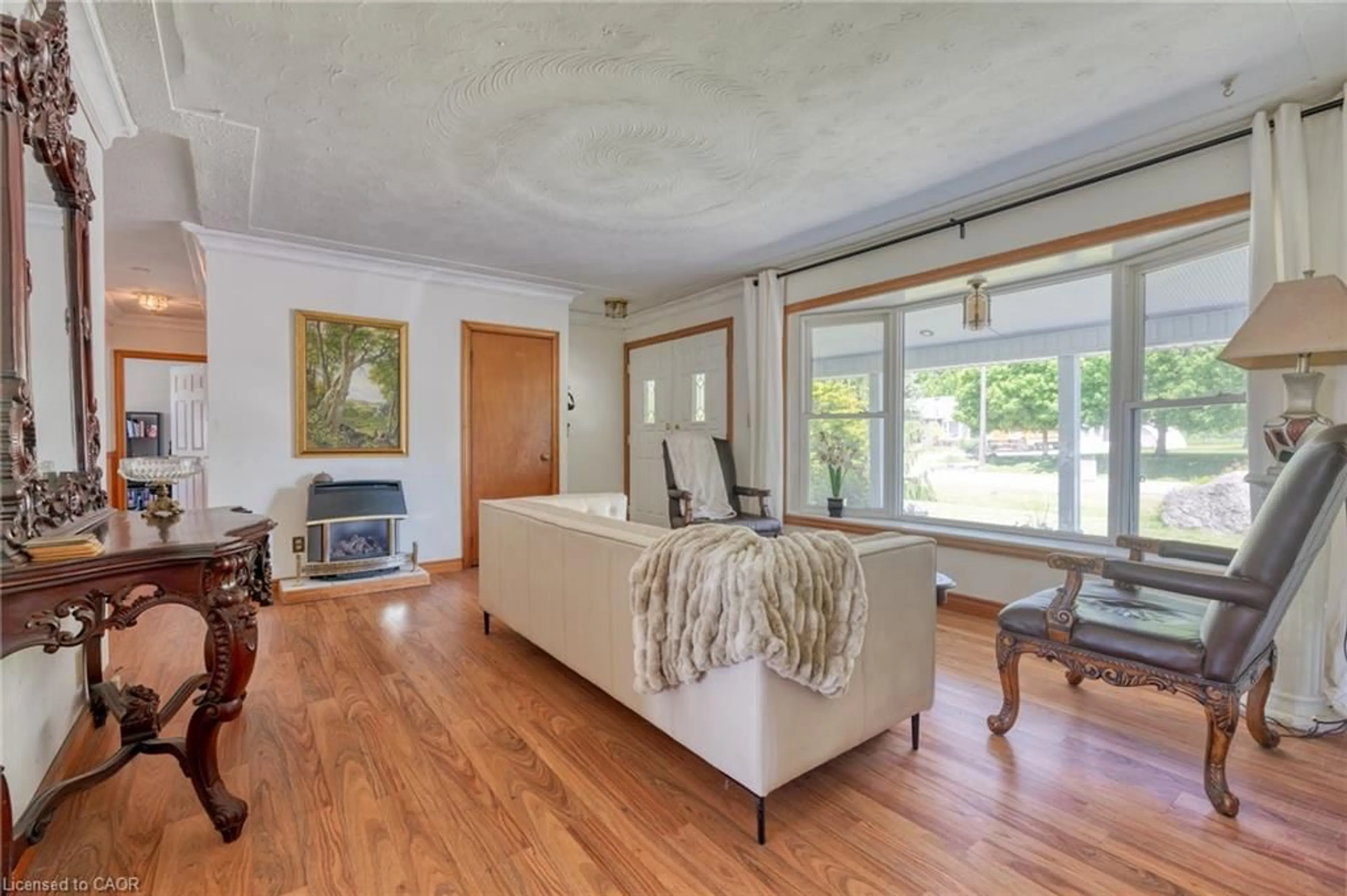 Living room with furniture, wood/laminate floor for 5 Mazza Ave, Dundas Ontario L9H 5E2
