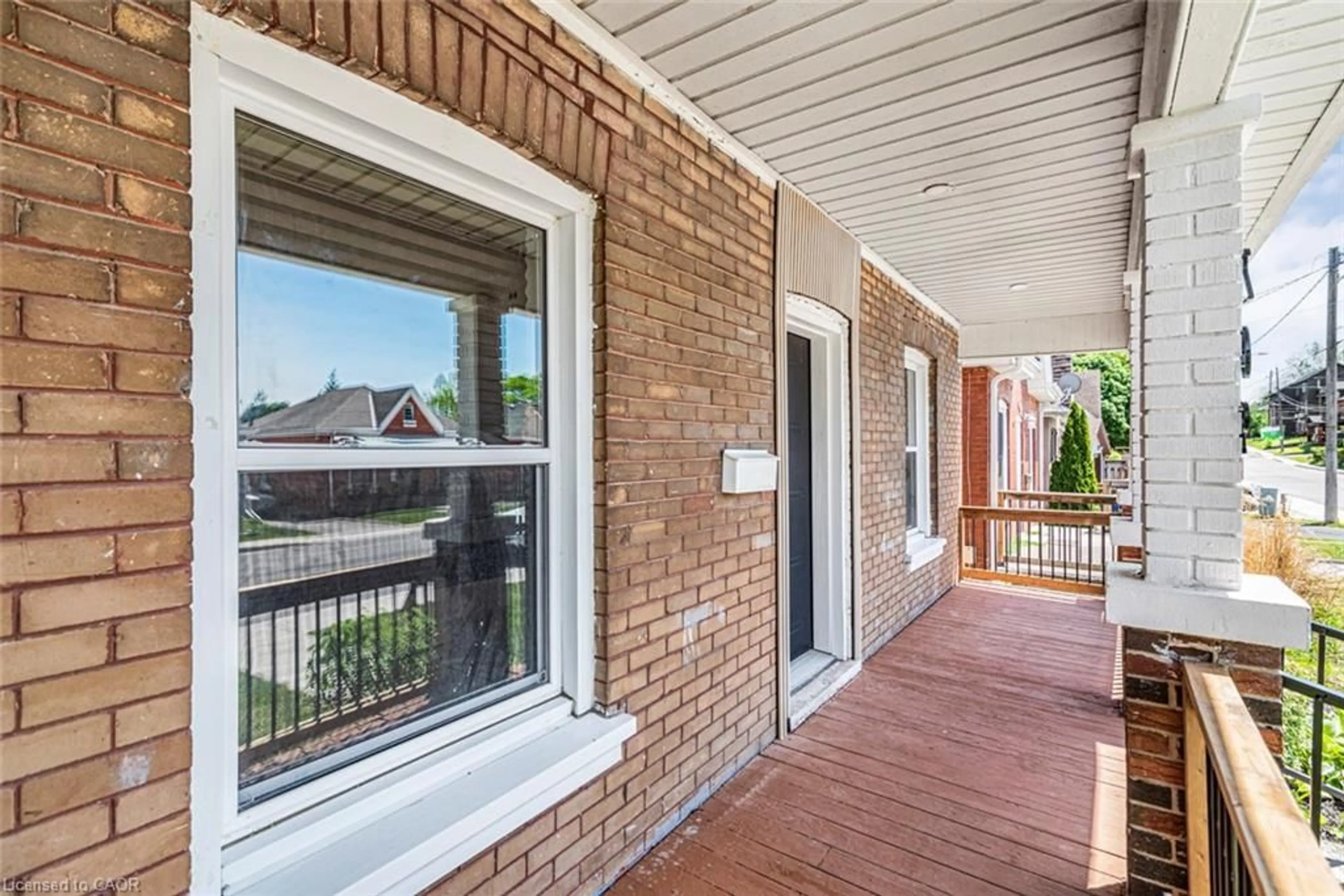 Home with brick exterior material, street for 209 Drummond St, Brantford Ontario N3S 6B1