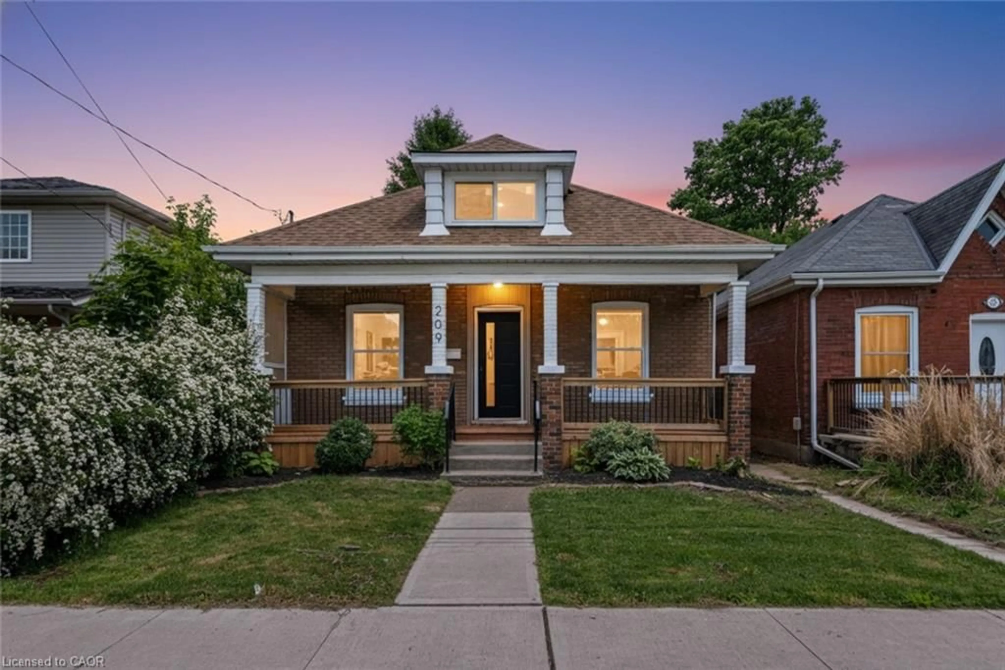 Home with brick exterior material, street for 209 Drummond St, Brantford Ontario N3S 6B1