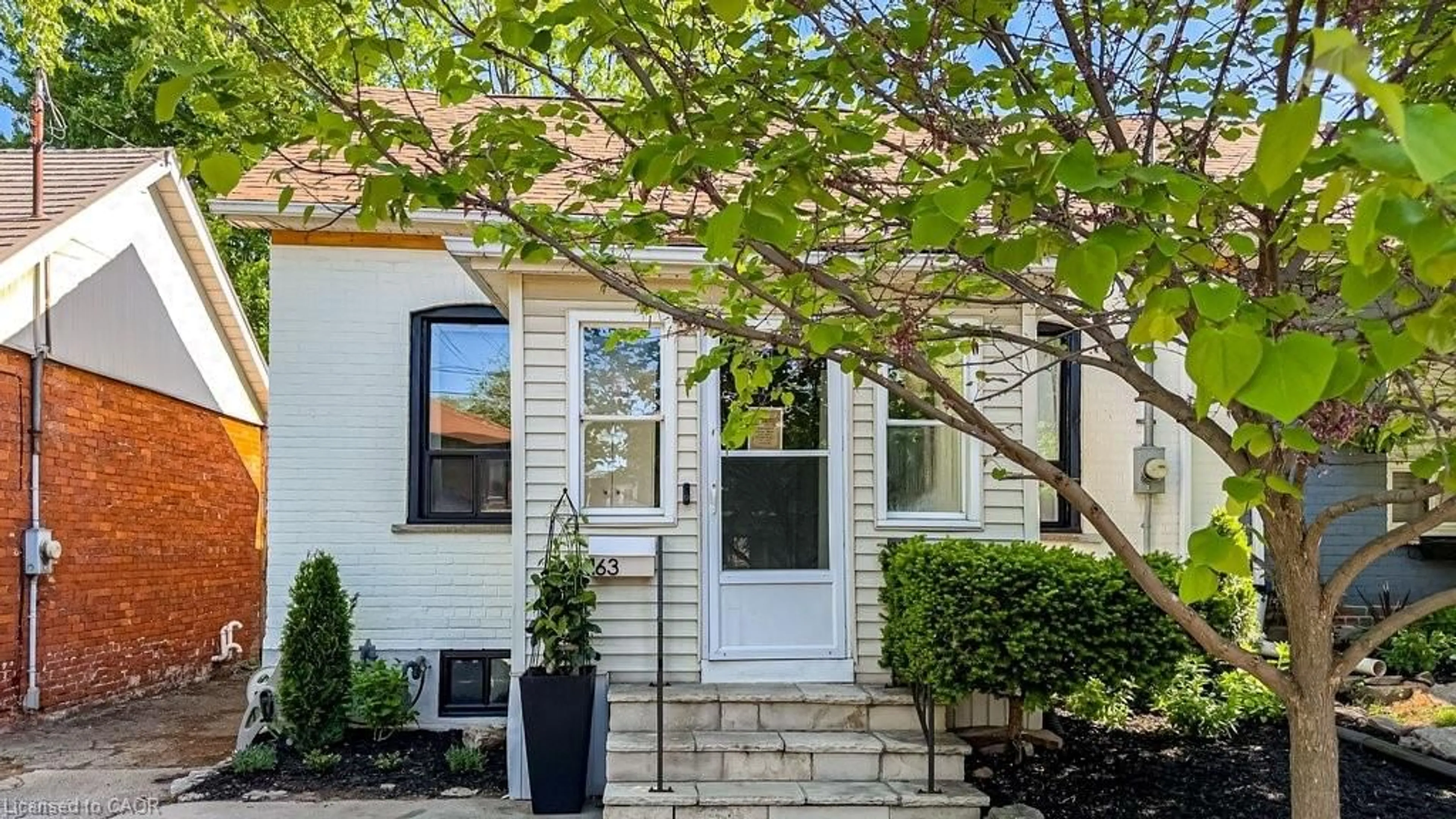 Home with vinyl exterior material, street for 163 Ferrie St, Hamilton Ontario L8L 3T4