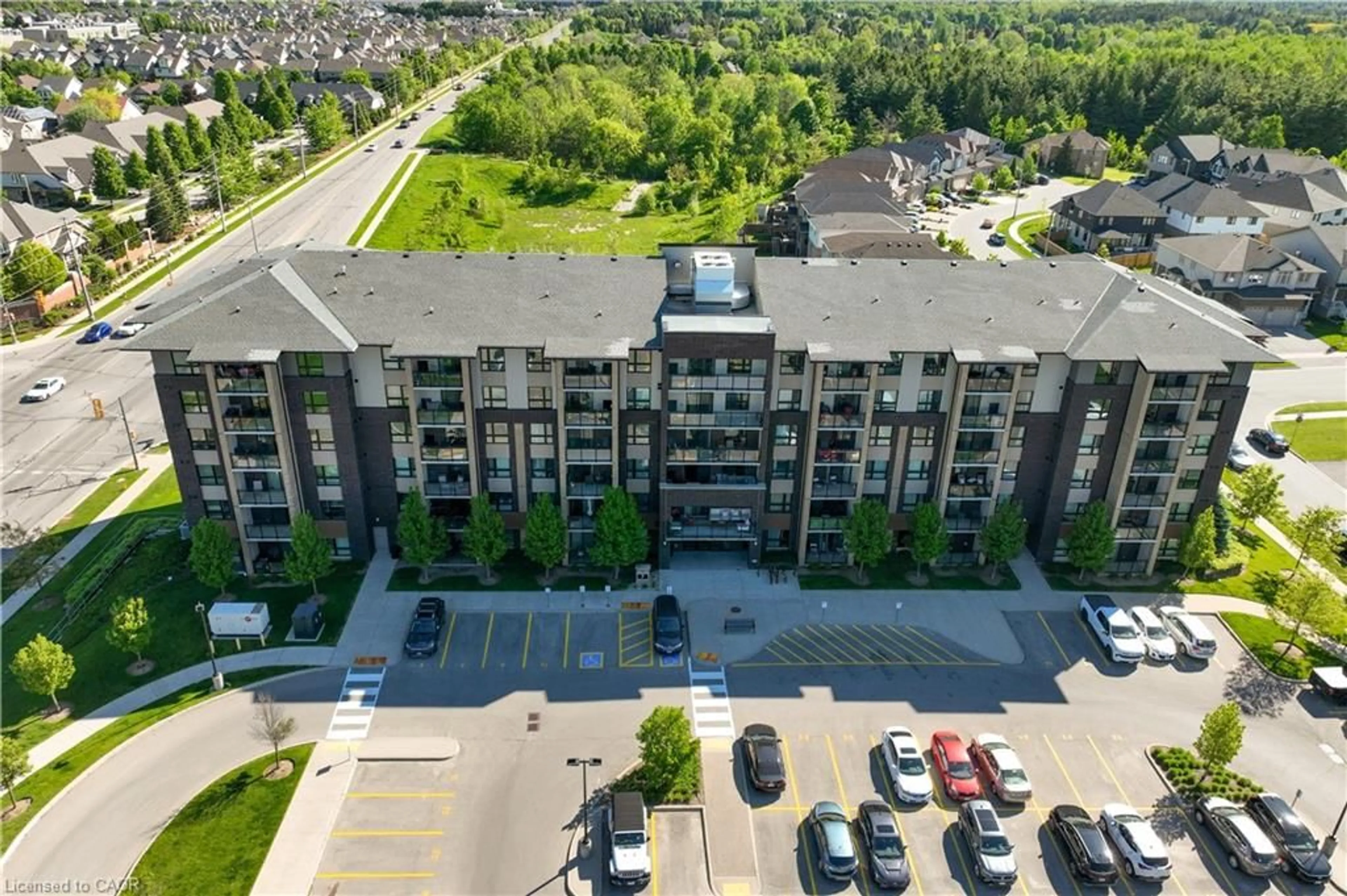 A pic from outside/outdoor area/front of a property/back of a property/a pic from drone, unknown for 7 Kay Cres #107, Guelph Ontario N1L 0L9