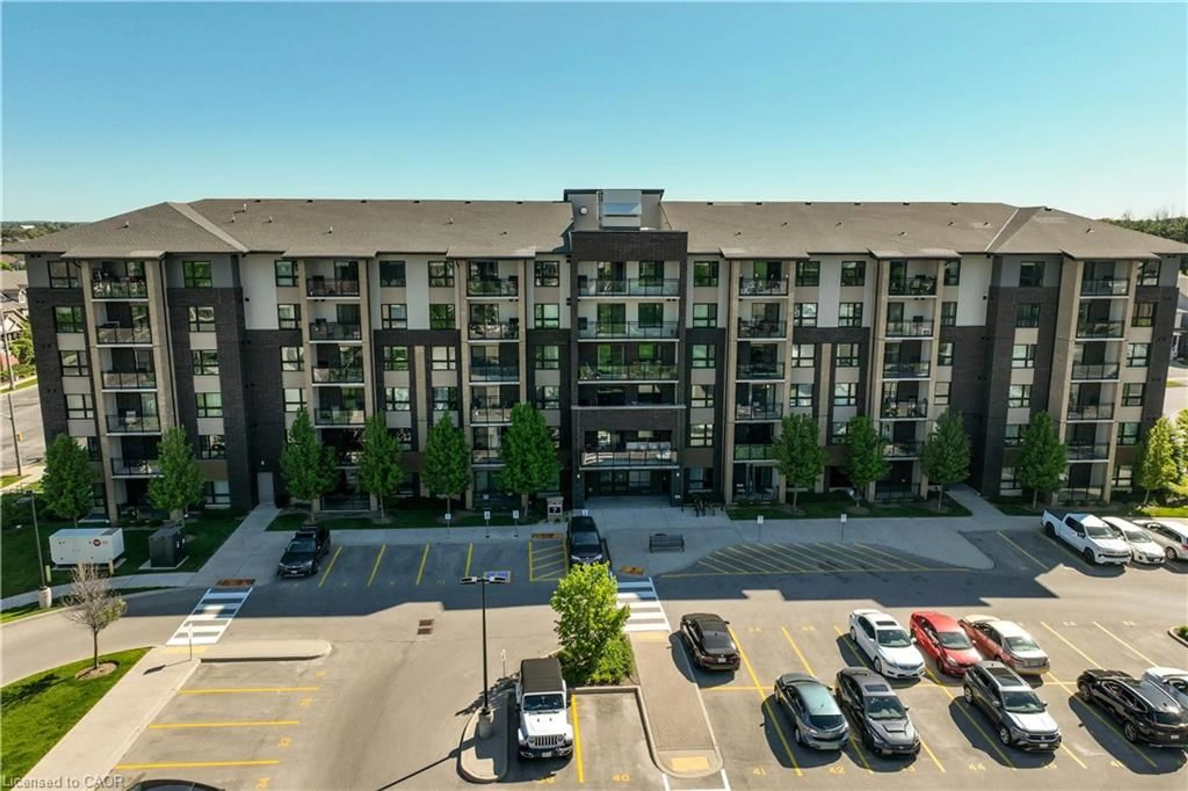 A pic from outside/outdoor area/front of a property/back of a property/a pic from drone, unknown for 7 Kay Cres #107, Guelph Ontario N1L 0L9