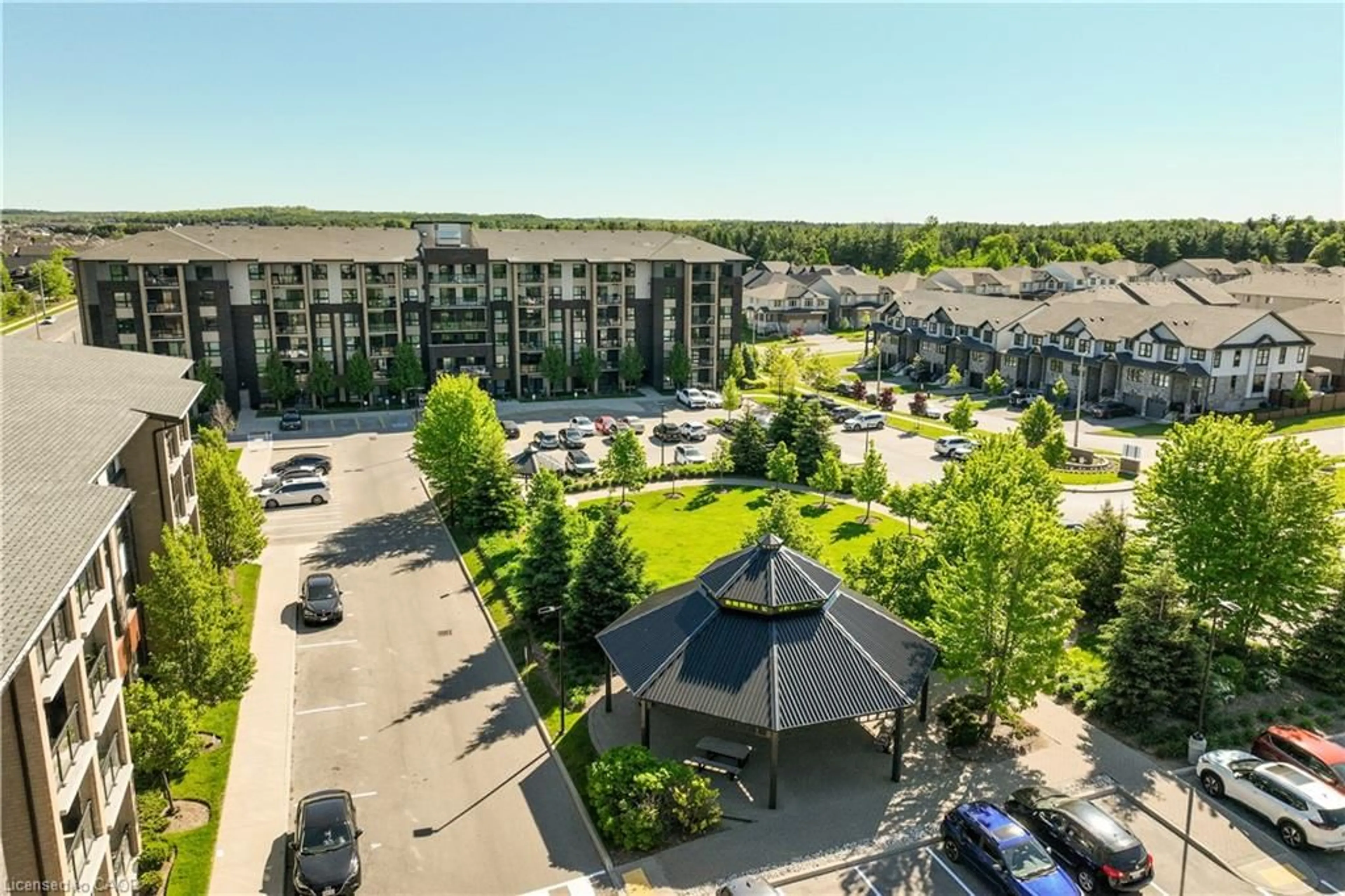 A pic from outside/outdoor area/front of a property/back of a property/a pic from drone, mountain view for 7 Kay Cres #107, Guelph Ontario N1L 0L9