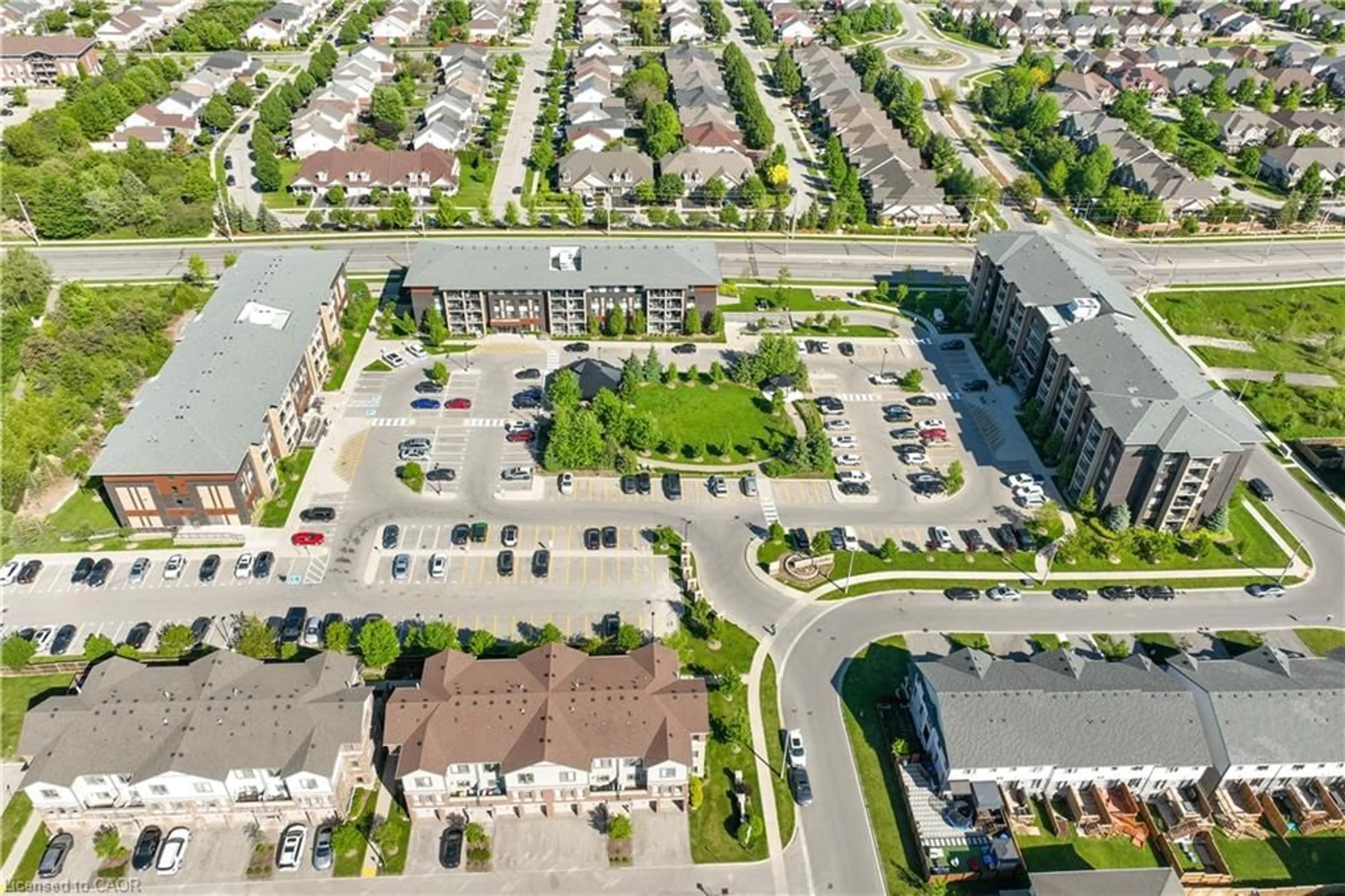 A pic from outside/outdoor area/front of a property/back of a property/a pic from drone, street for 7 Kay Cres #107, Guelph Ontario N1L 0L9