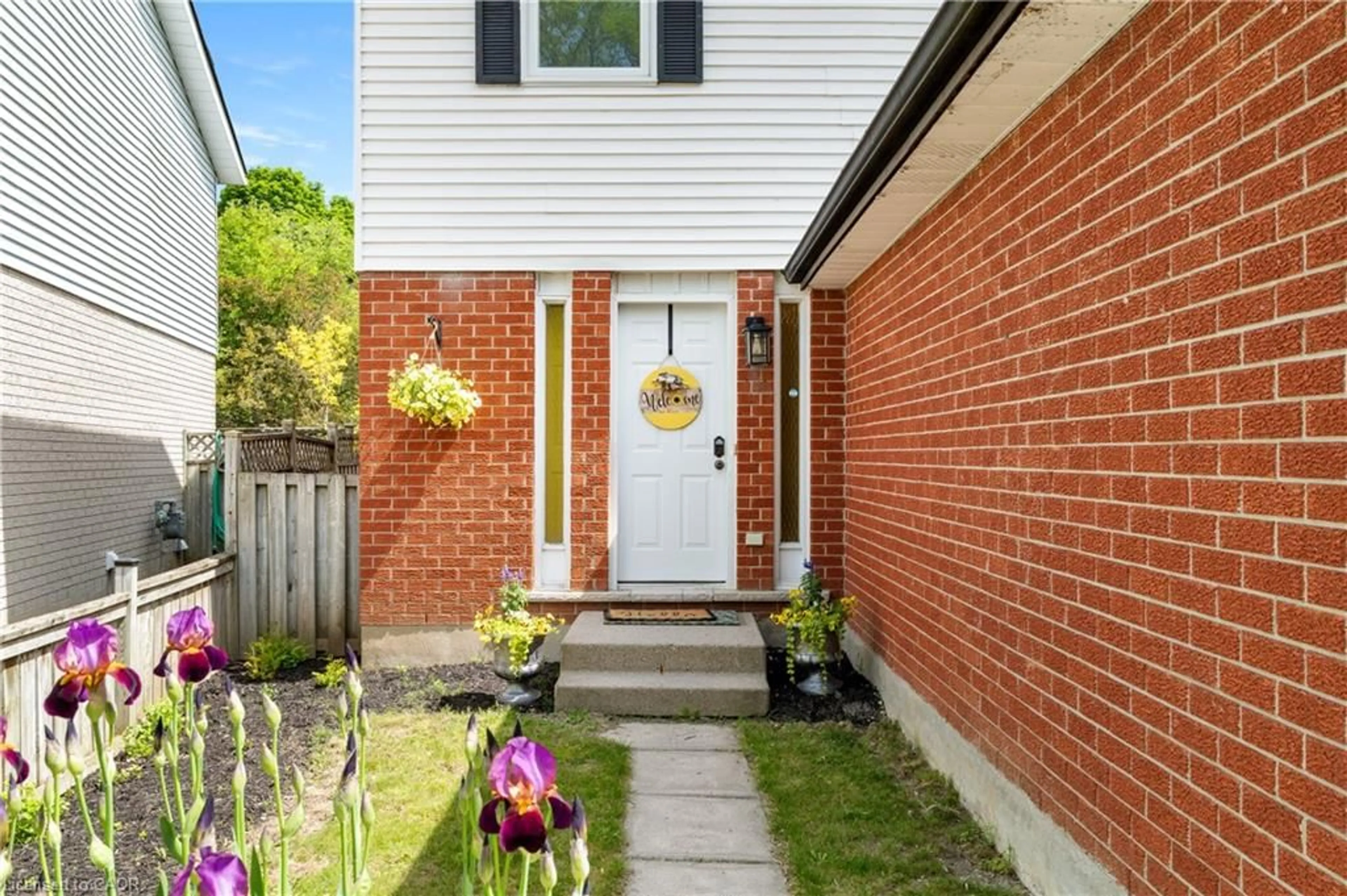 Home with brick exterior material, street for 52 Walman Dr, Guelph Ontario N1G 4H4