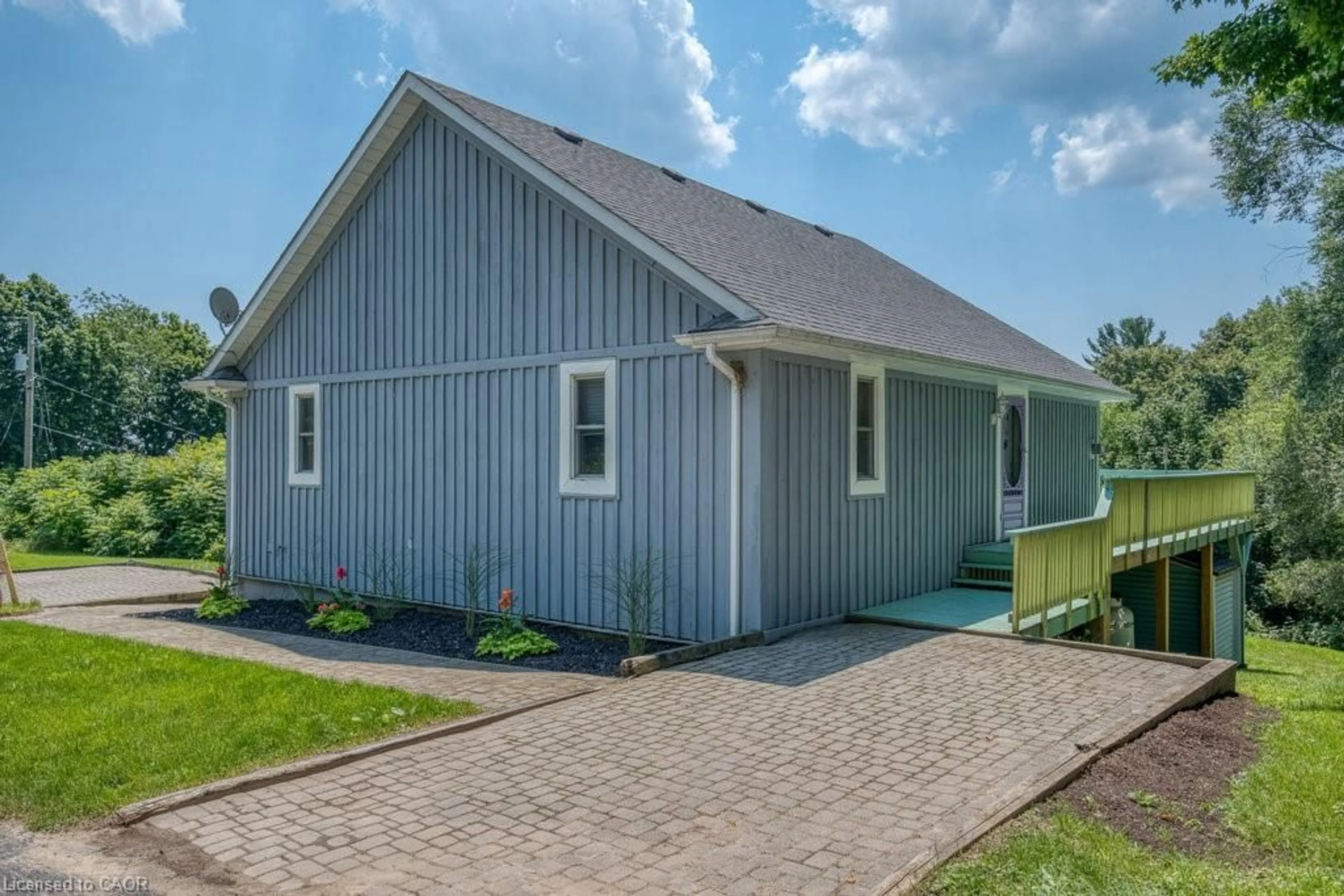 Home with vinyl exterior material, street for 210 Hillside Ave, Normandale Ontario N0E 1T0