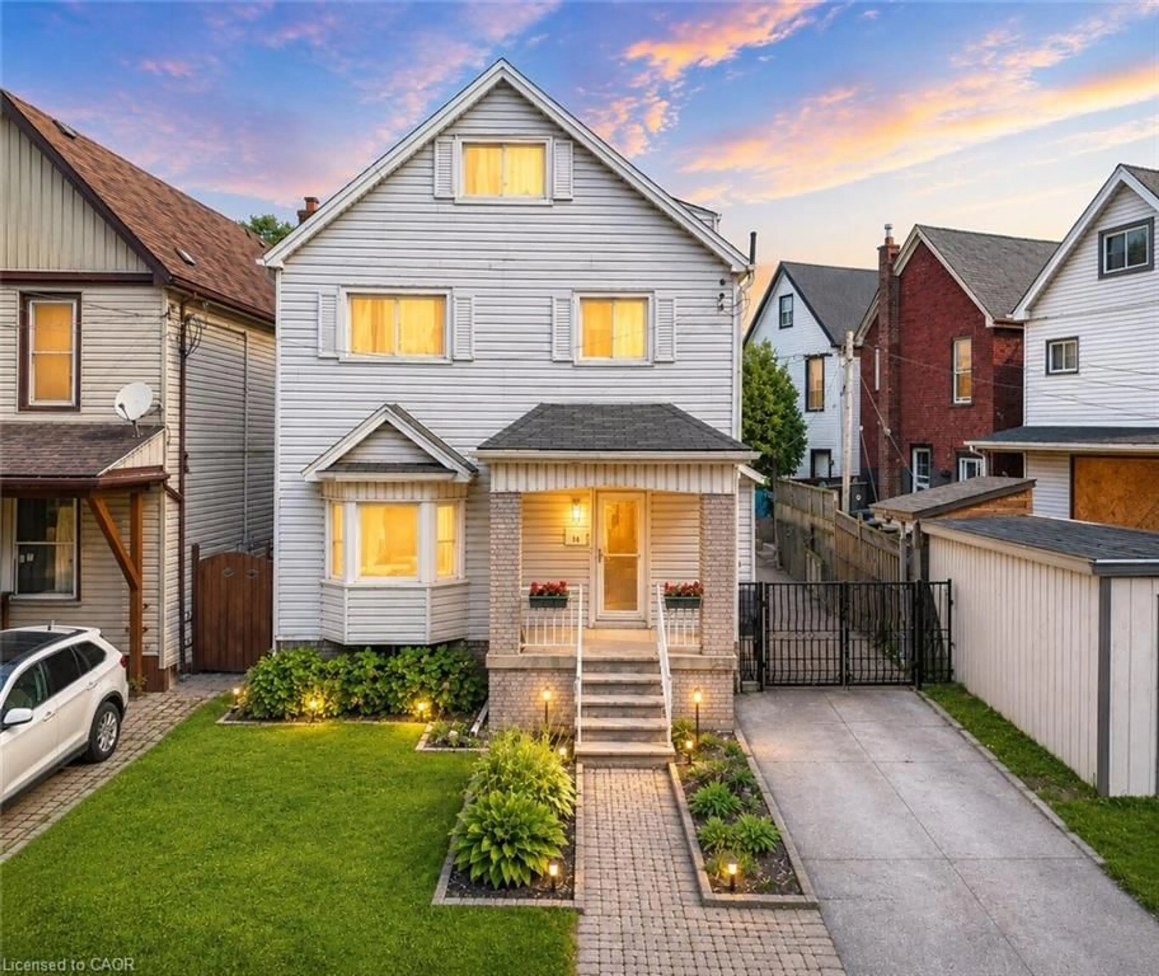 Home with brick exterior material, street for 14 Niagara St, Hamilton Ontario L8L 6A2