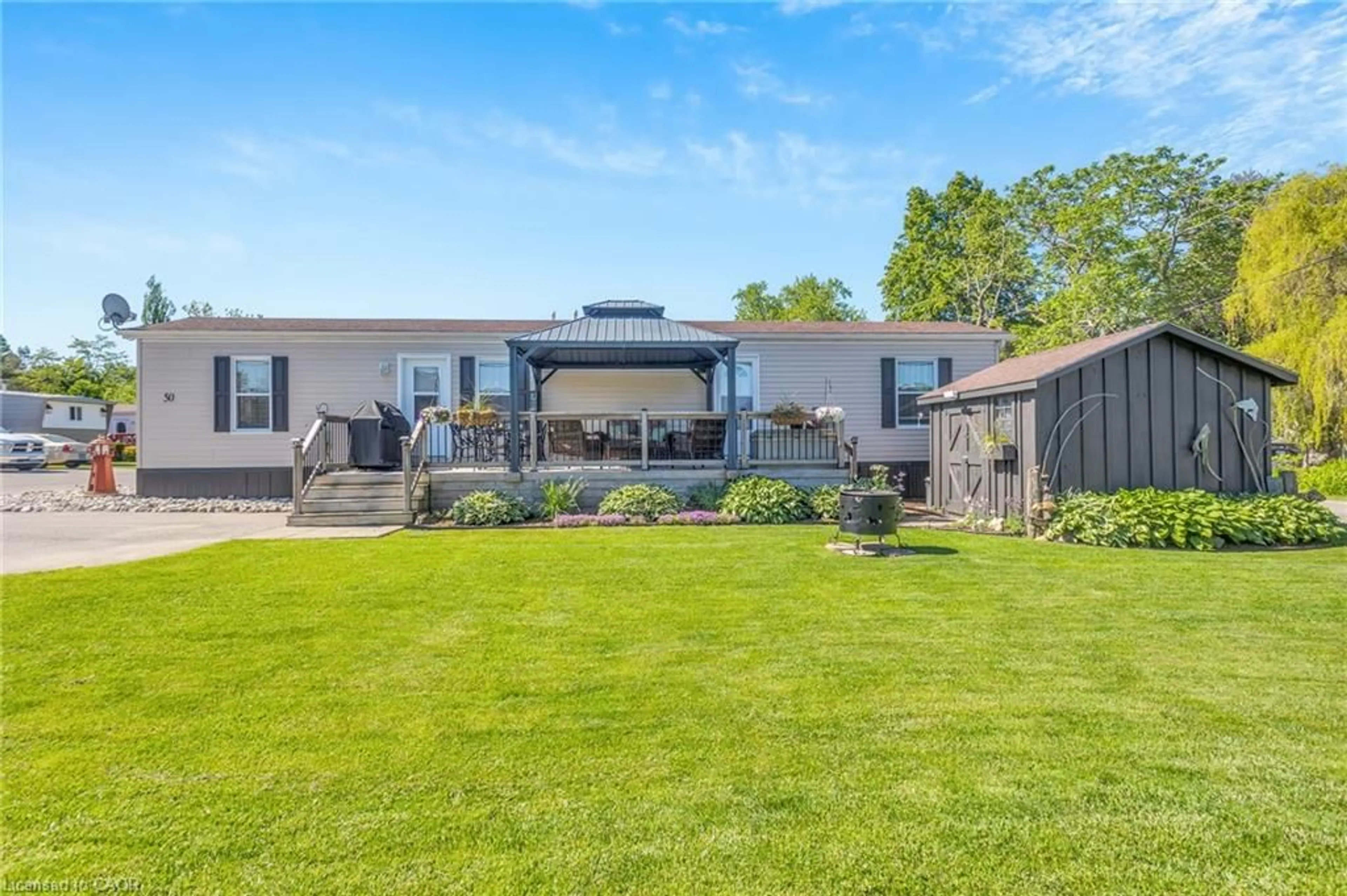 A pic from outside/outdoor area/front of a property/back of a property/a pic from drone, unknown for 33 Pitt St #50, Port Burwell Ontario N0J 1T0
