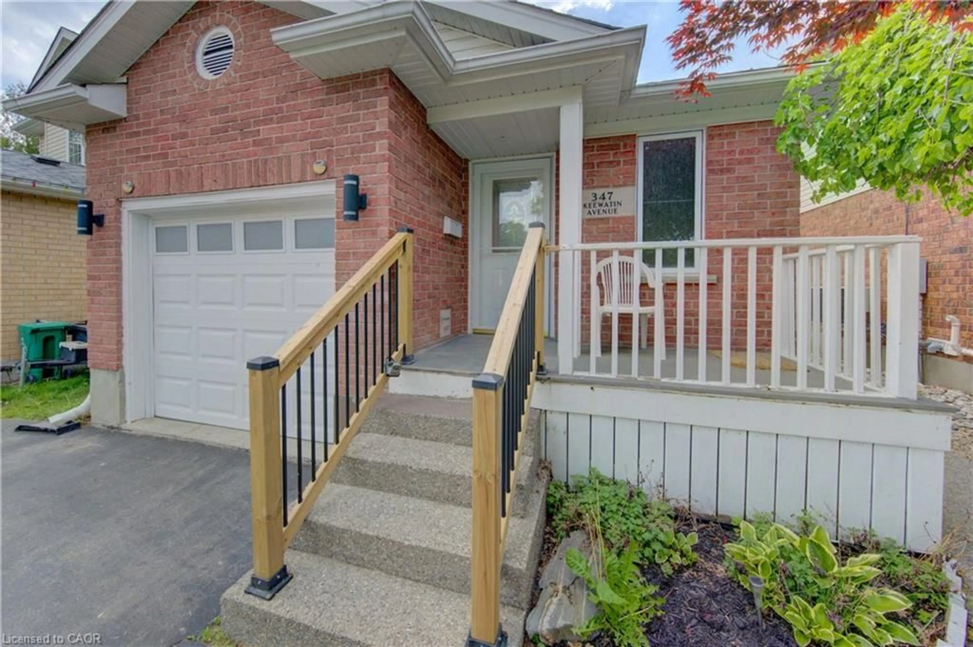 Home with brick exterior material, street for 347 Keewatin Ave, Kitchener Ontario N2B 3W2