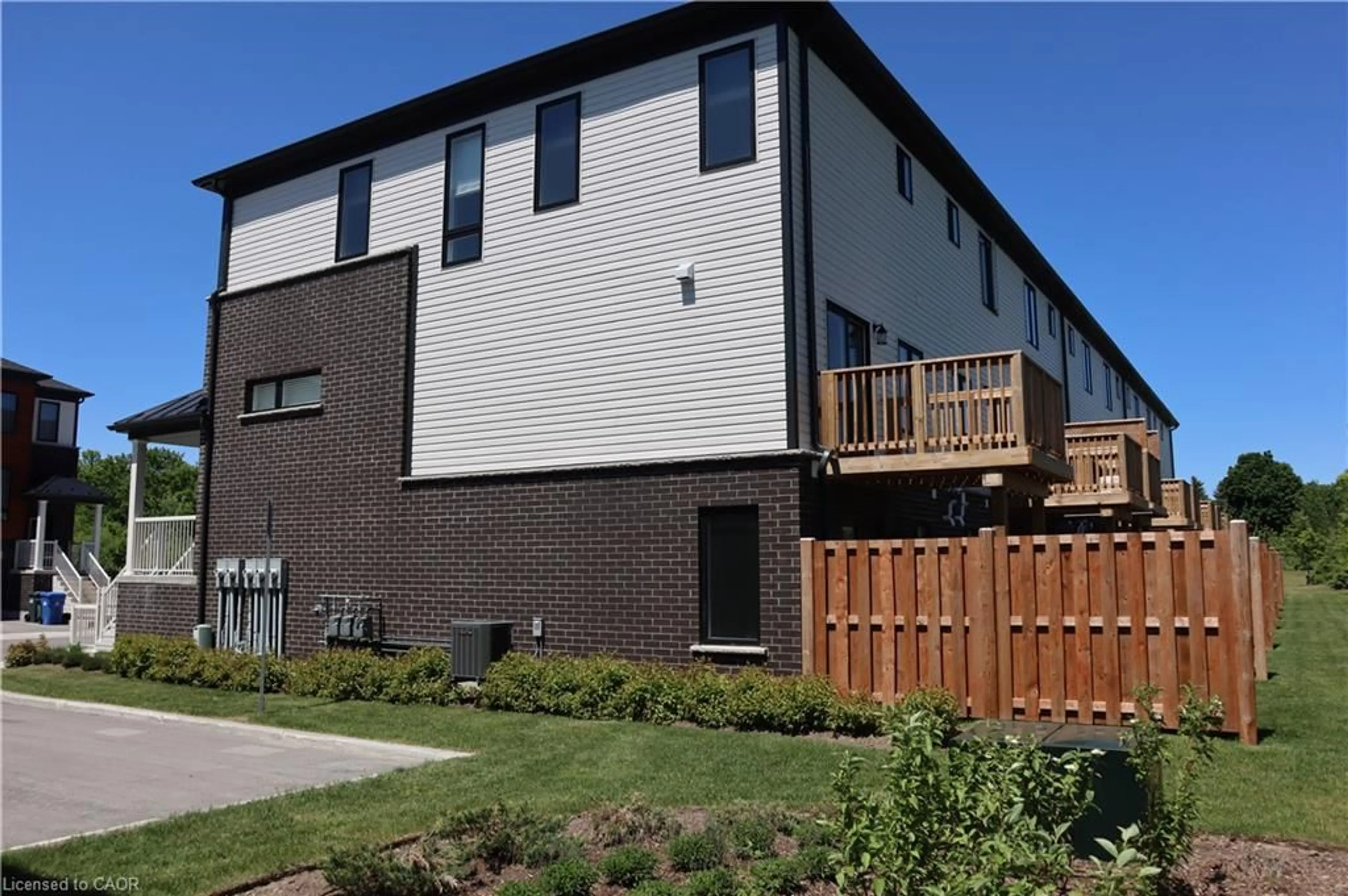 Home with brick exterior material, building for 15 Sora Lane, Guelph Ontario N1E 0T4