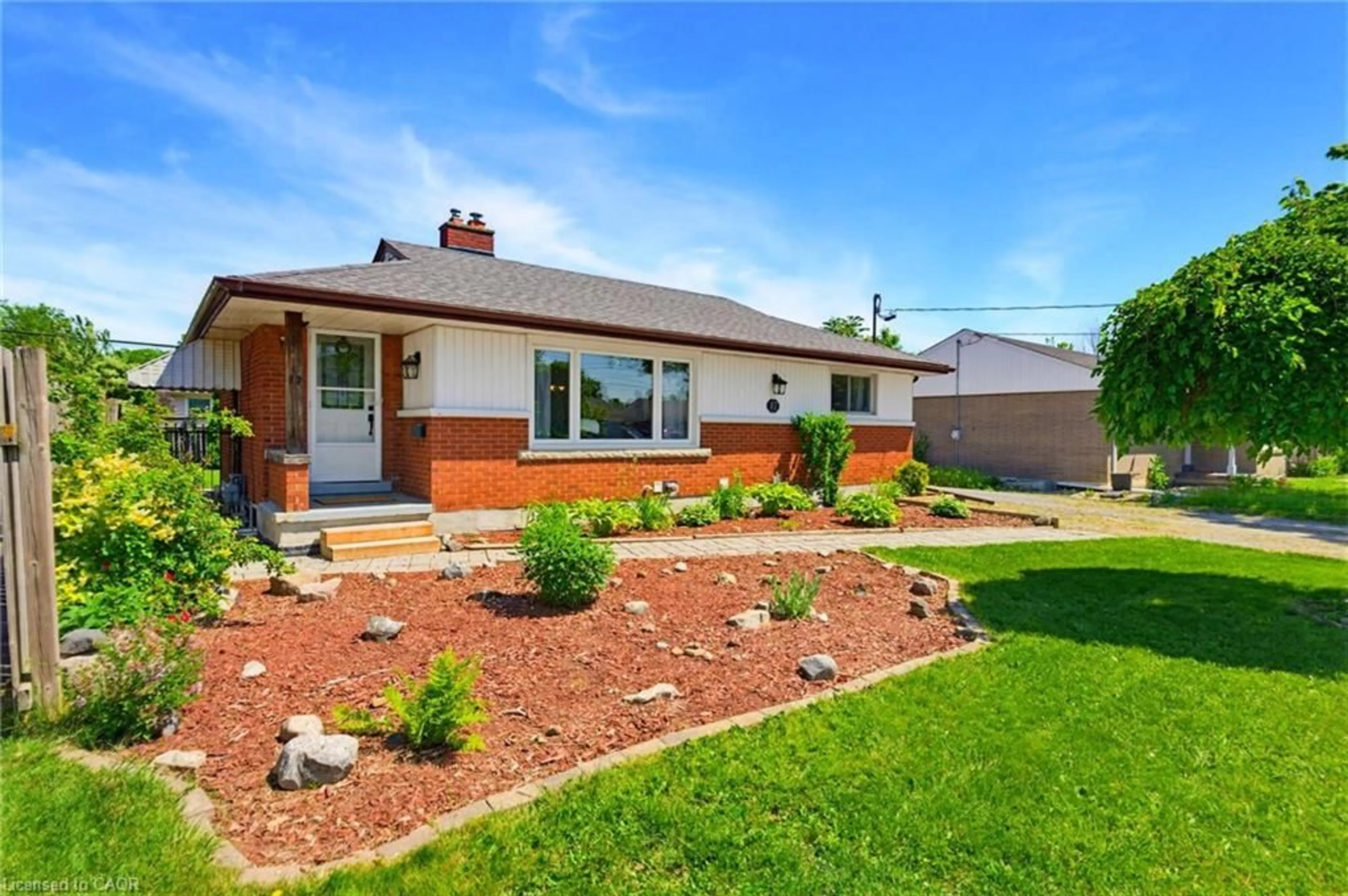 Home with brick exterior material, street for 17 Broadmore Ave, St. Catharines Ontario L2M 6A4
