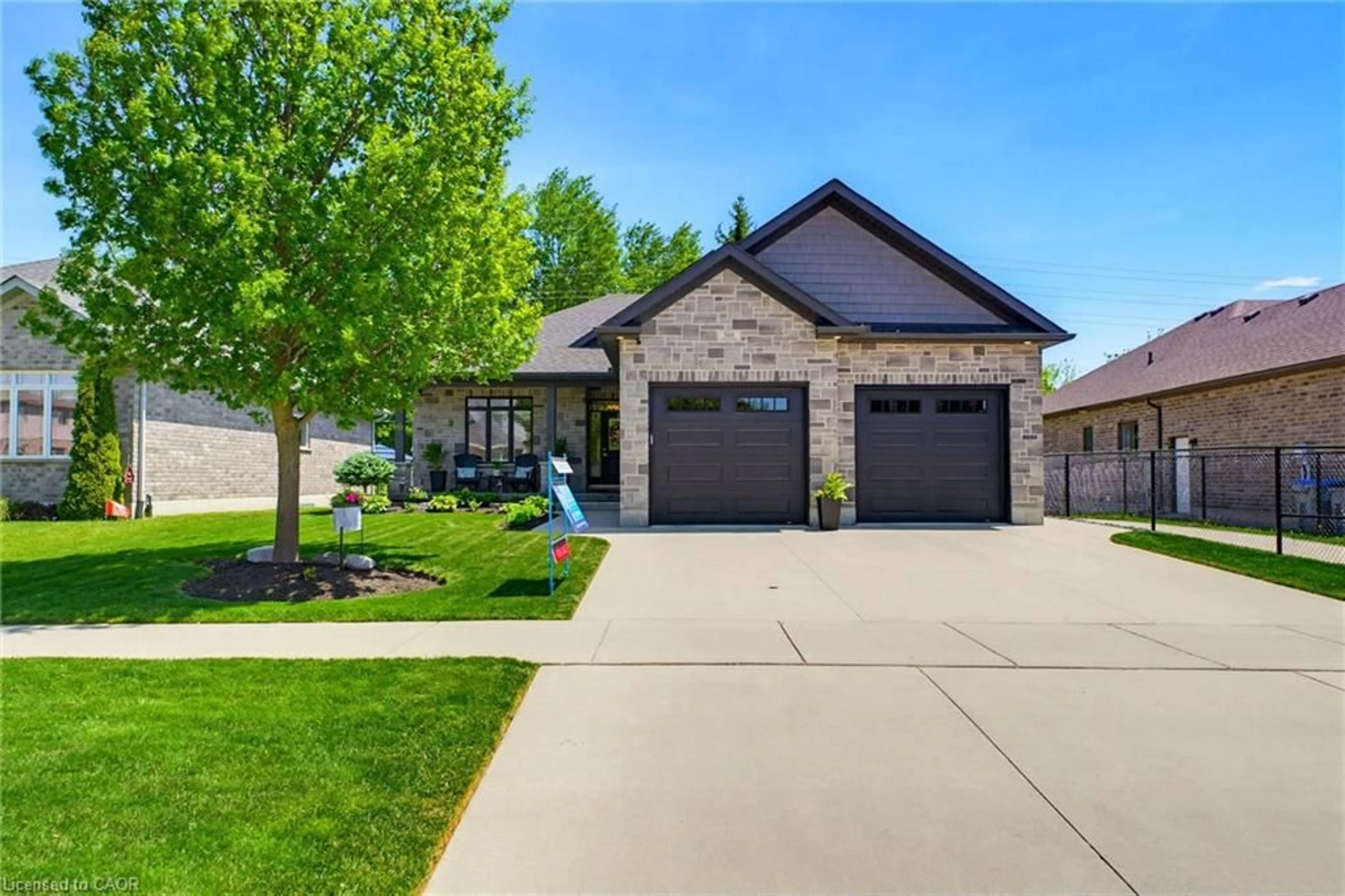 Home with brick exterior material, street for 560 Rogers Rd, Listowel Ontario N4W 0G1