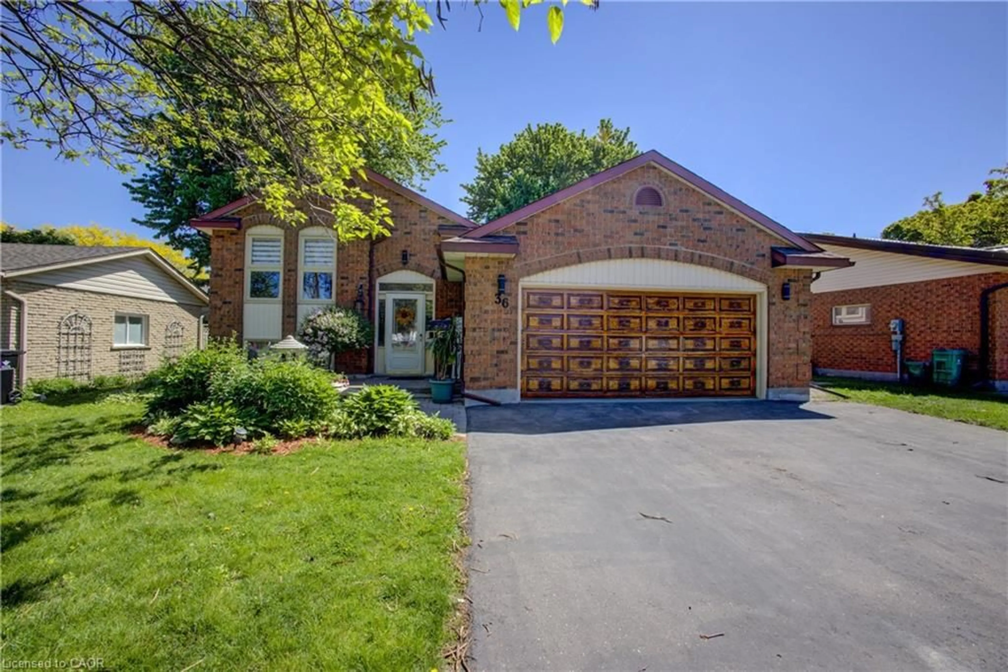 Home with brick exterior material, street for 36 Westchester Dr, Kitchener Ontario N2B 1W7