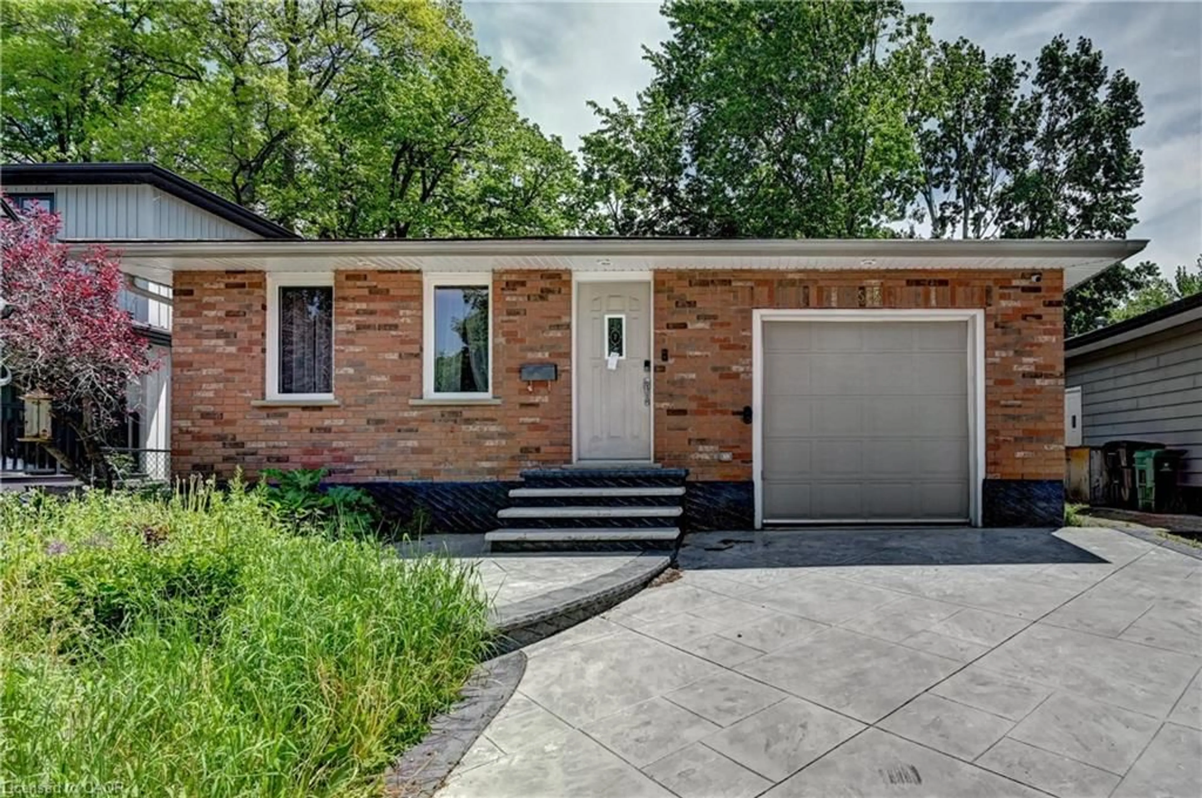 Home with brick exterior material, street for 525 Fallingbrook Dr, Waterloo Ontario N2L 4N2