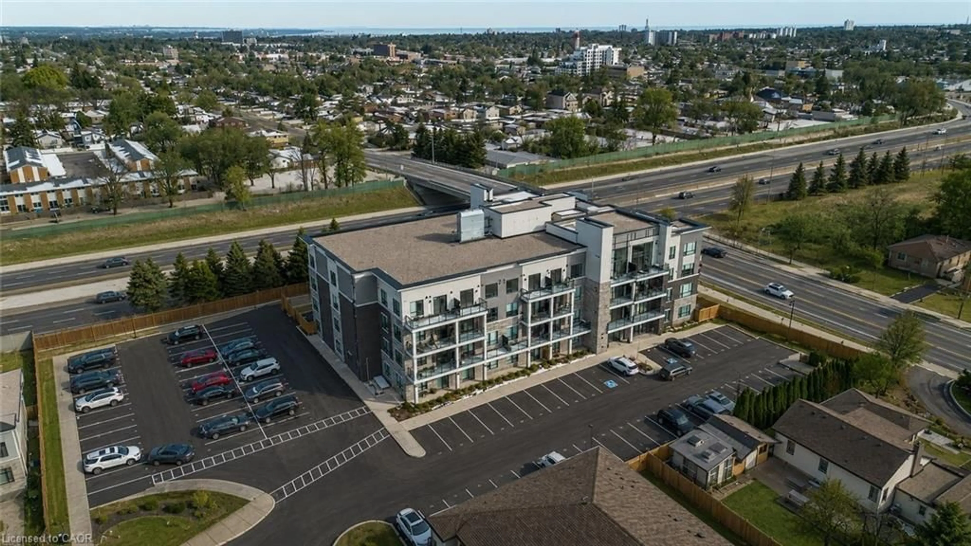 A pic from outside/outdoor area/front of a property/back of a property/a pic from drone, building for 120 Springvalley Cres #104, Hamilton Ontario L9C 0G2