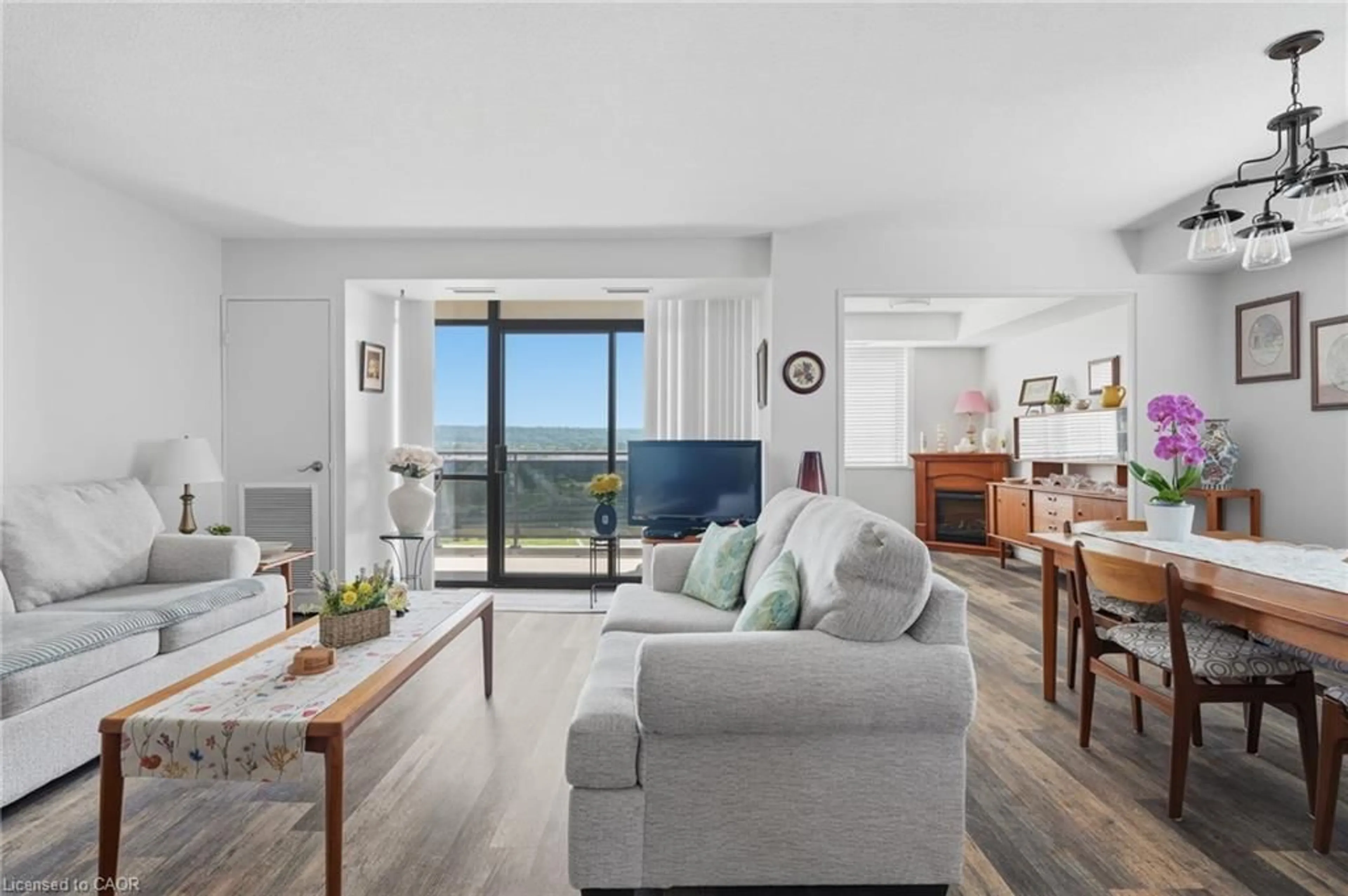 Living room with furniture, unknown for 301 Frances Ave #1207, Stoney Creek Ontario L8E 3W6
