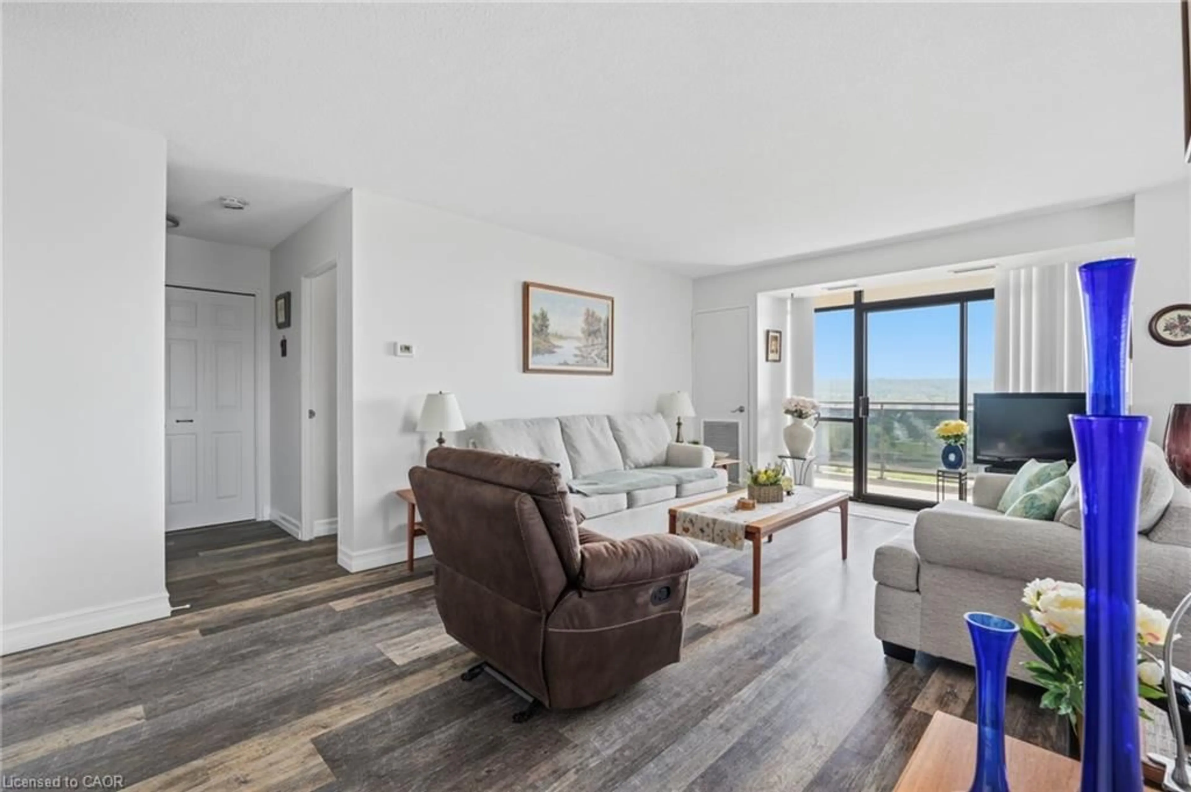 Living room with furniture, unknown for 301 Frances Ave #1207, Stoney Creek Ontario L8E 3W6