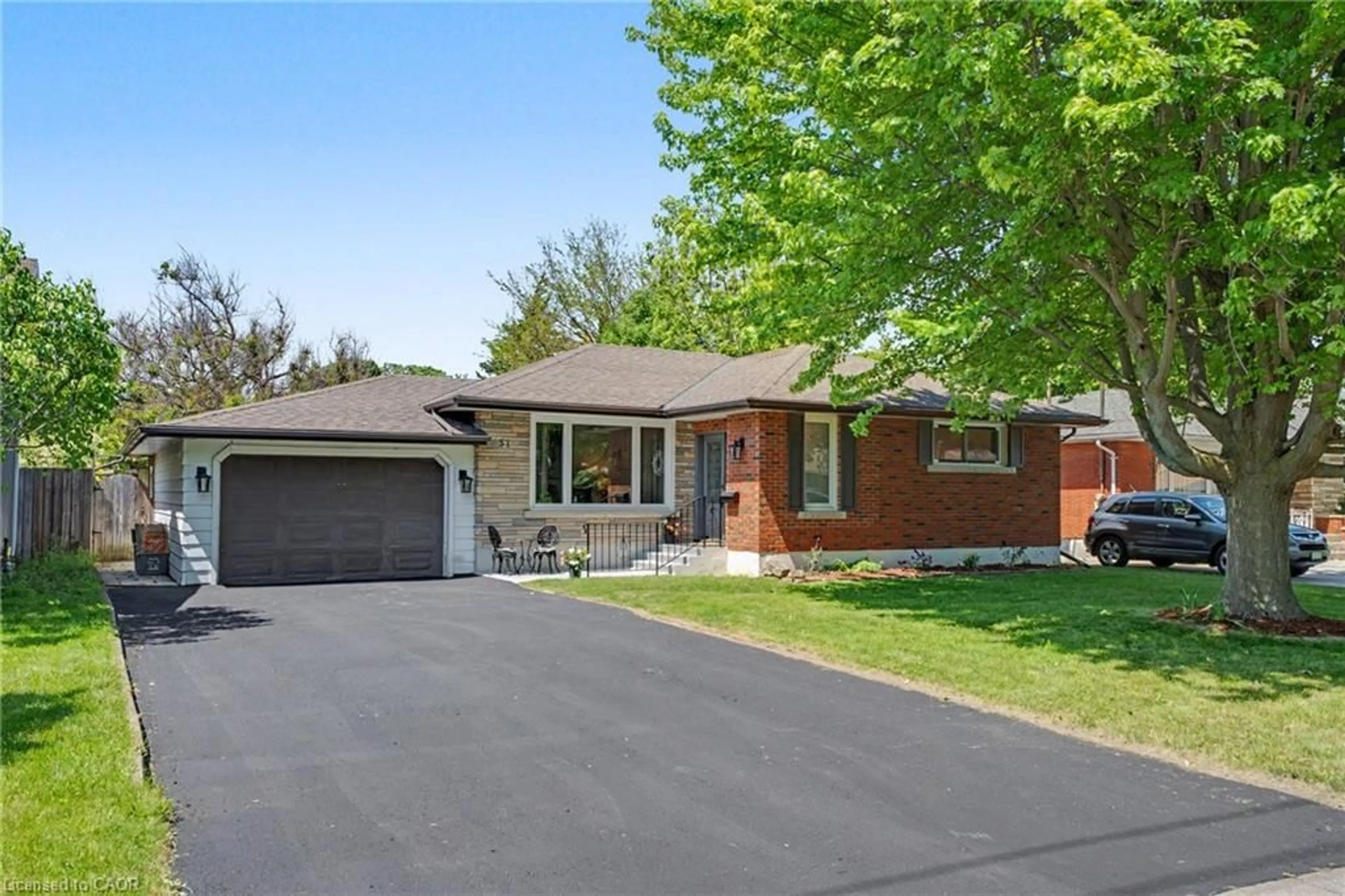 Home with brick exterior material, street for 51 Parnell Rd, St. Catharines Ontario L2N 2W5
