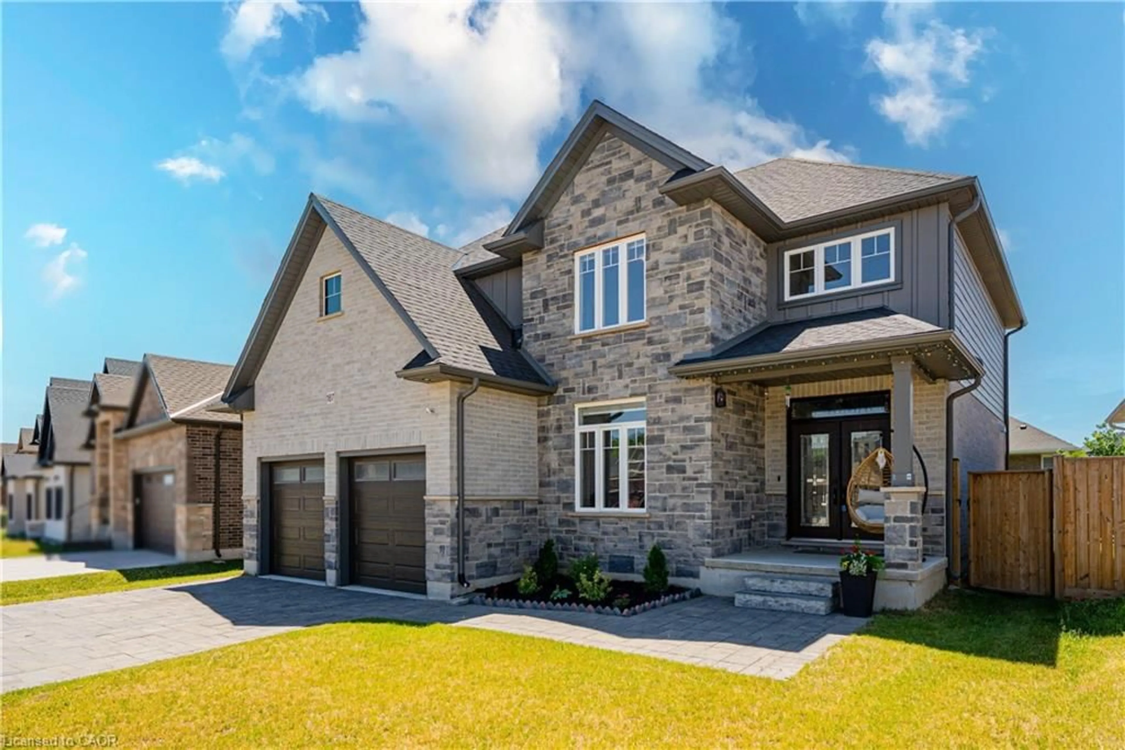 Home with brick exterior material, street for 187 Boardwalk Way, Dorchester Ontario N0L 1G2
