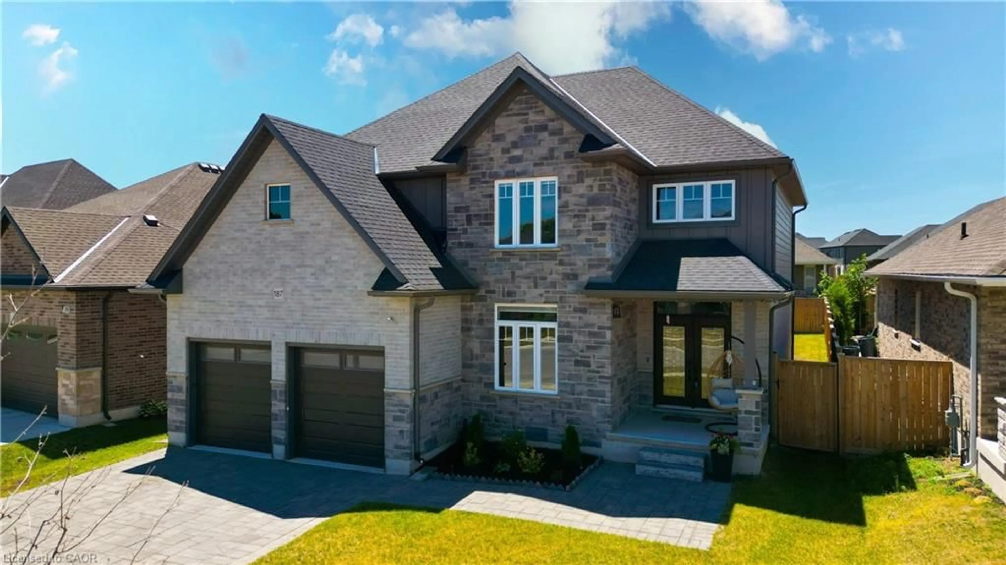 Home with brick exterior material, street for 187 Boardwalk Way, Dorchester Ontario N0L 1G2