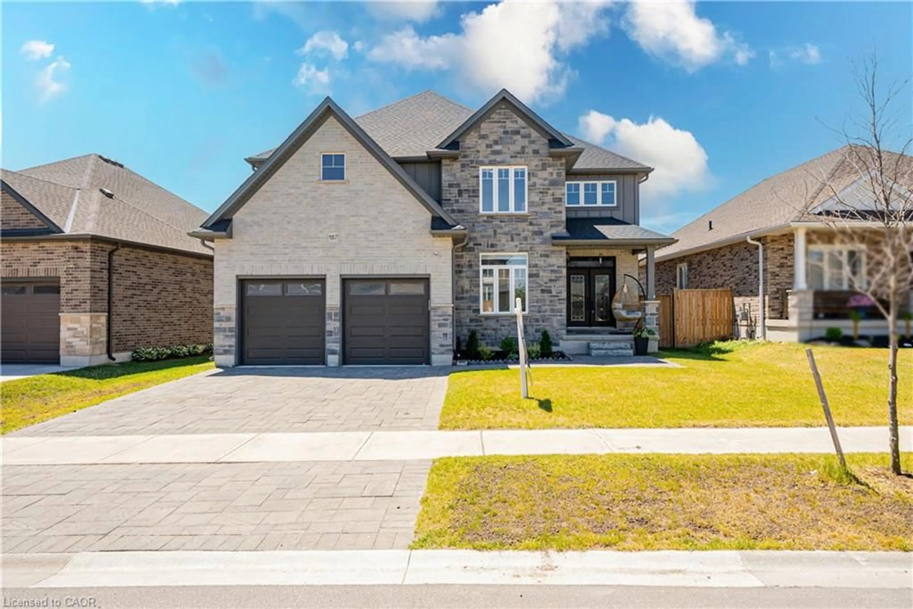 Home with brick exterior material, street for 187 Boardwalk Way, Dorchester Ontario N0L 1G2
