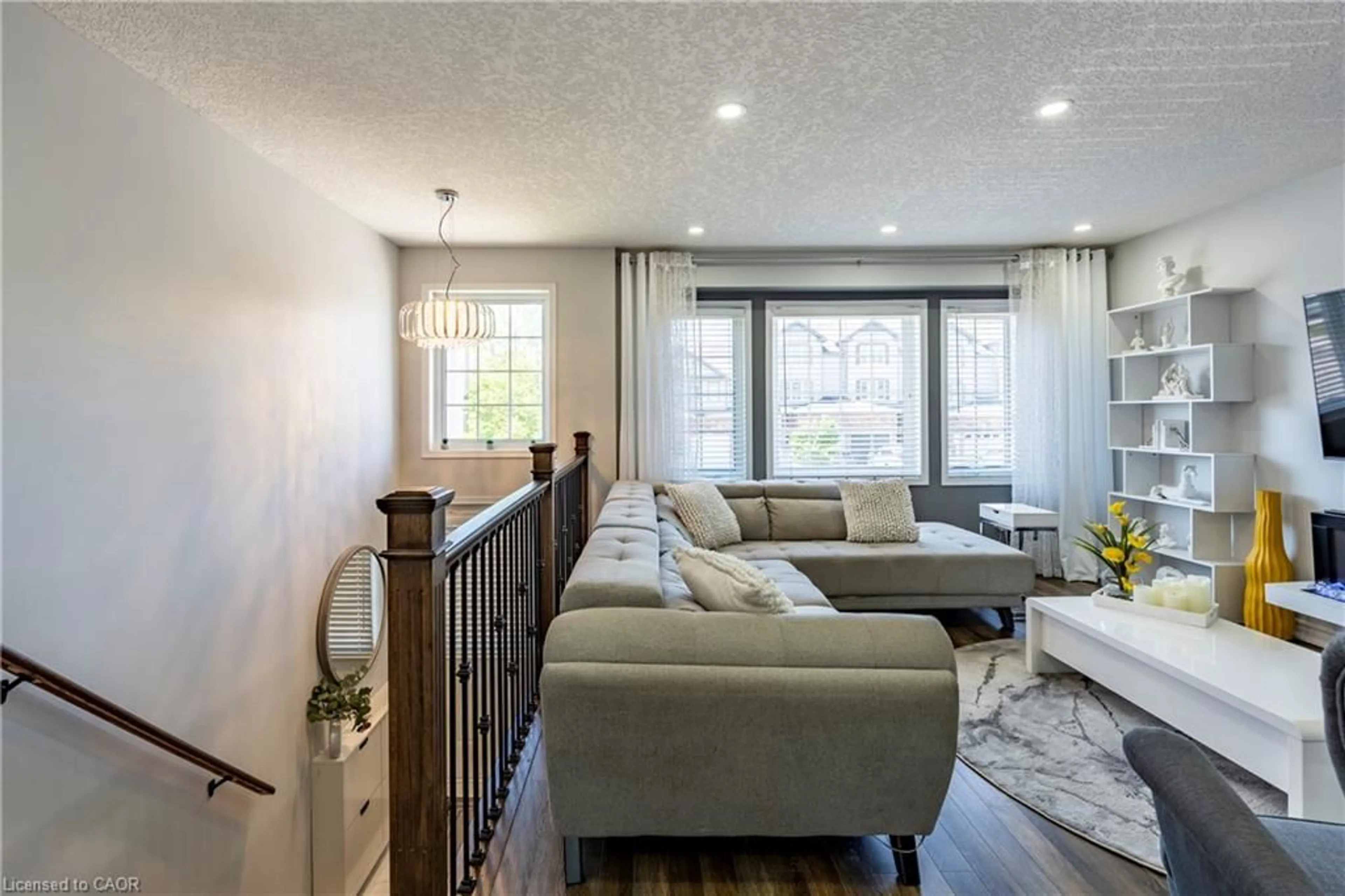 Living room with furniture, wood/laminate floor for 18 Madeleine St, Kitchener Ontario N2R 1V5