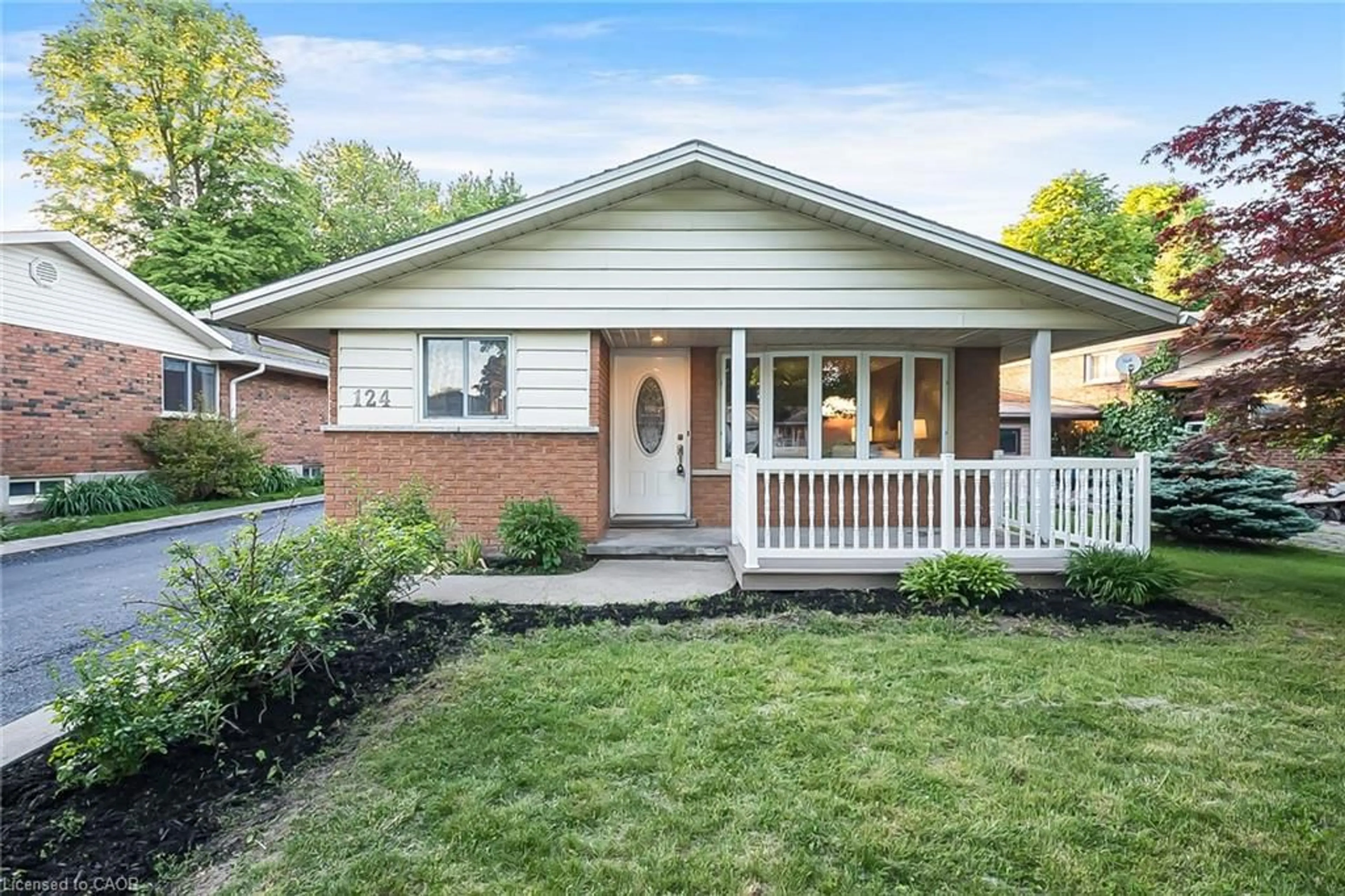 Home with brick exterior material, street for 124 Dunsmere Dr, Kitchener Ontario N2E 1V7