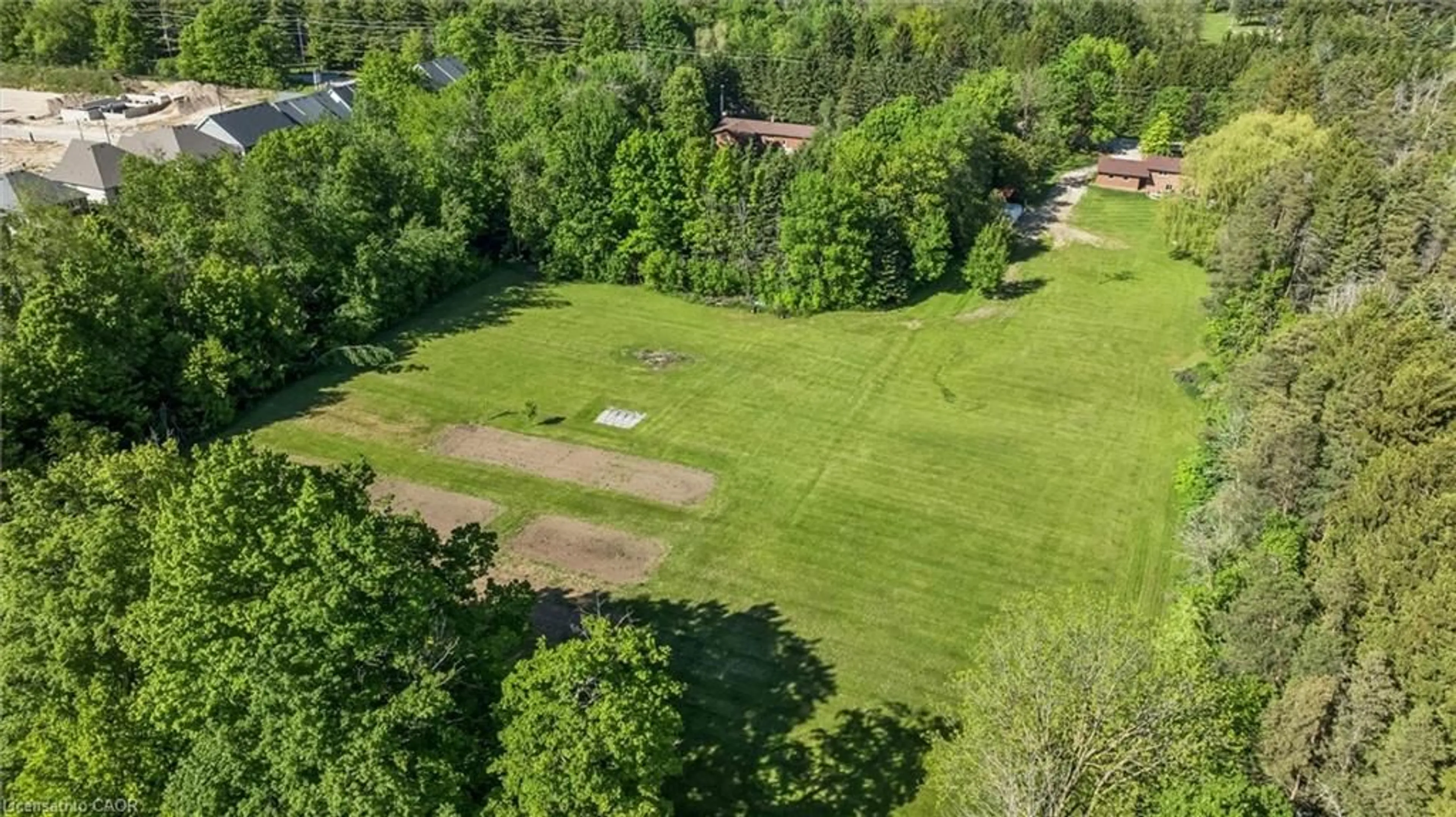 A pic from outside/outdoor area/front of a property/back of a property/a pic from drone, forest/trees view for 103 Gilkison St, Elora Ontario N0B 1S0