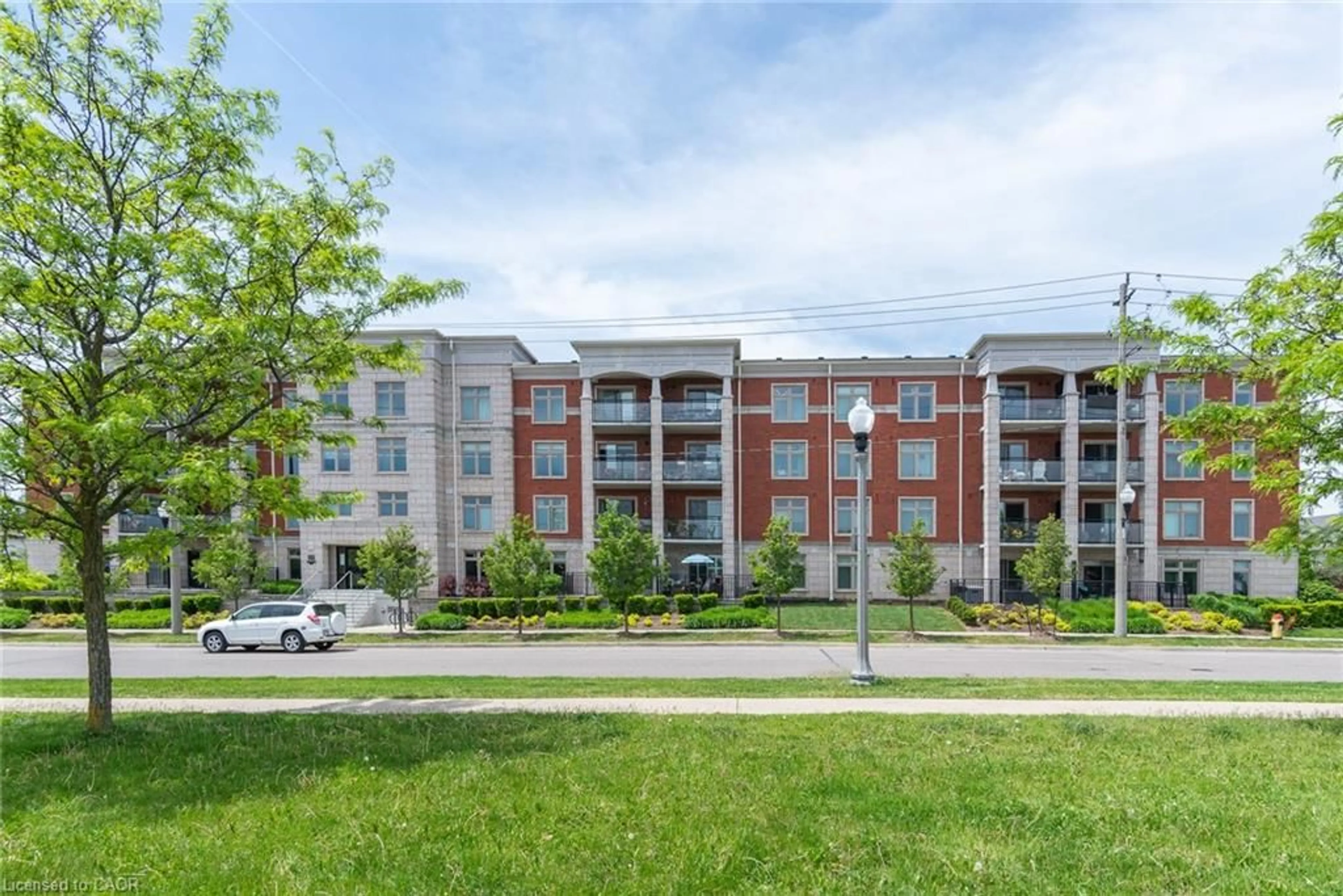 A pic from outside/outdoor area/front of a property/back of a property/a pic from drone, building for 155 Commonwealth St #205, Kitchener Ontario N2E 0G5