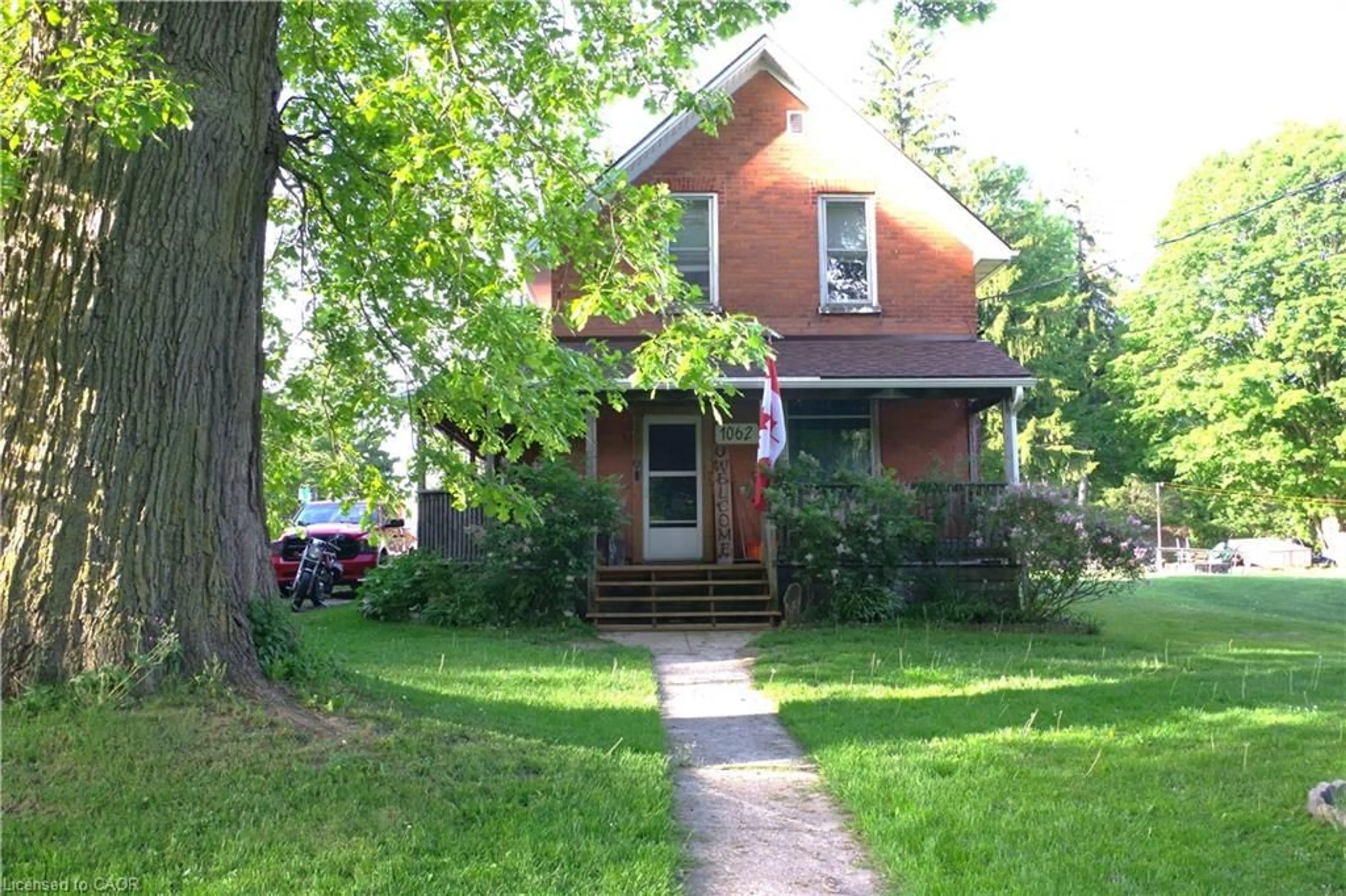 Home with brick exterior material, street for 1062 Howick St, Wroxeter Ontario N0G 2X0